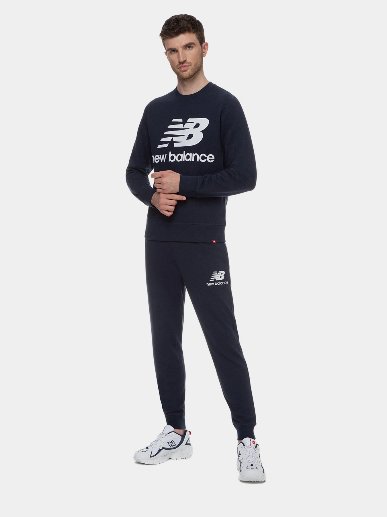 Брюки New Balance Essentials Stacked Logo модель MP03558ECL Брюки New Balance Essentials Stacked Logo модель MP03558ECL Фото