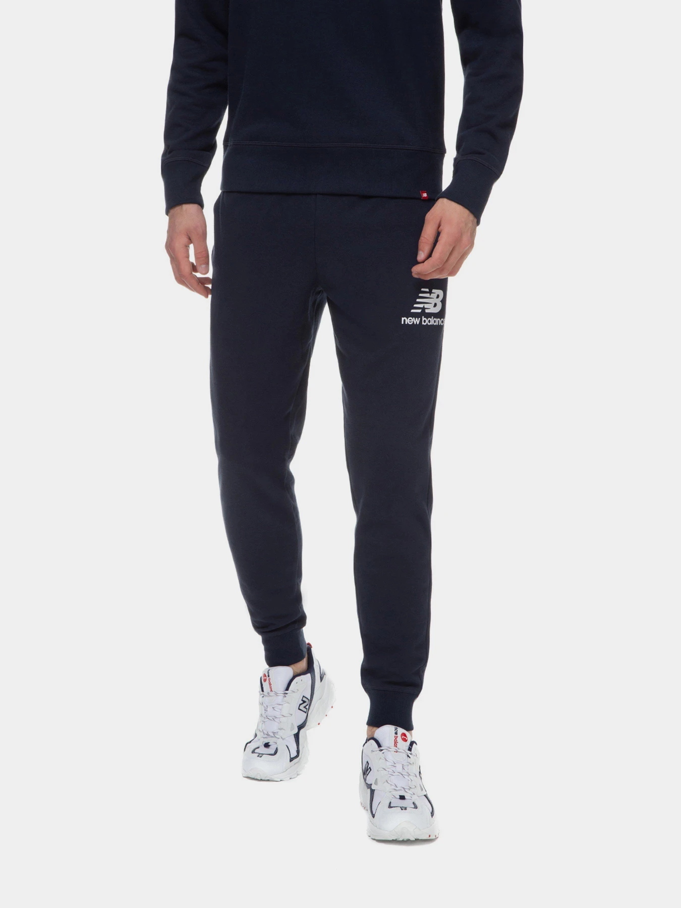 Брюки New Balance Essentials Stacked Logo модель MP03558ECL Брюки New Balance Essentials Stacked Logo модель MP03558ECL Фото
