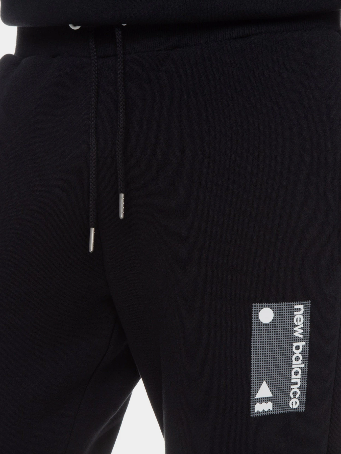 Брюки New Balance Essentials модель MP11504BK Брюки New Balance Essentials модель MP11504BK Фото
