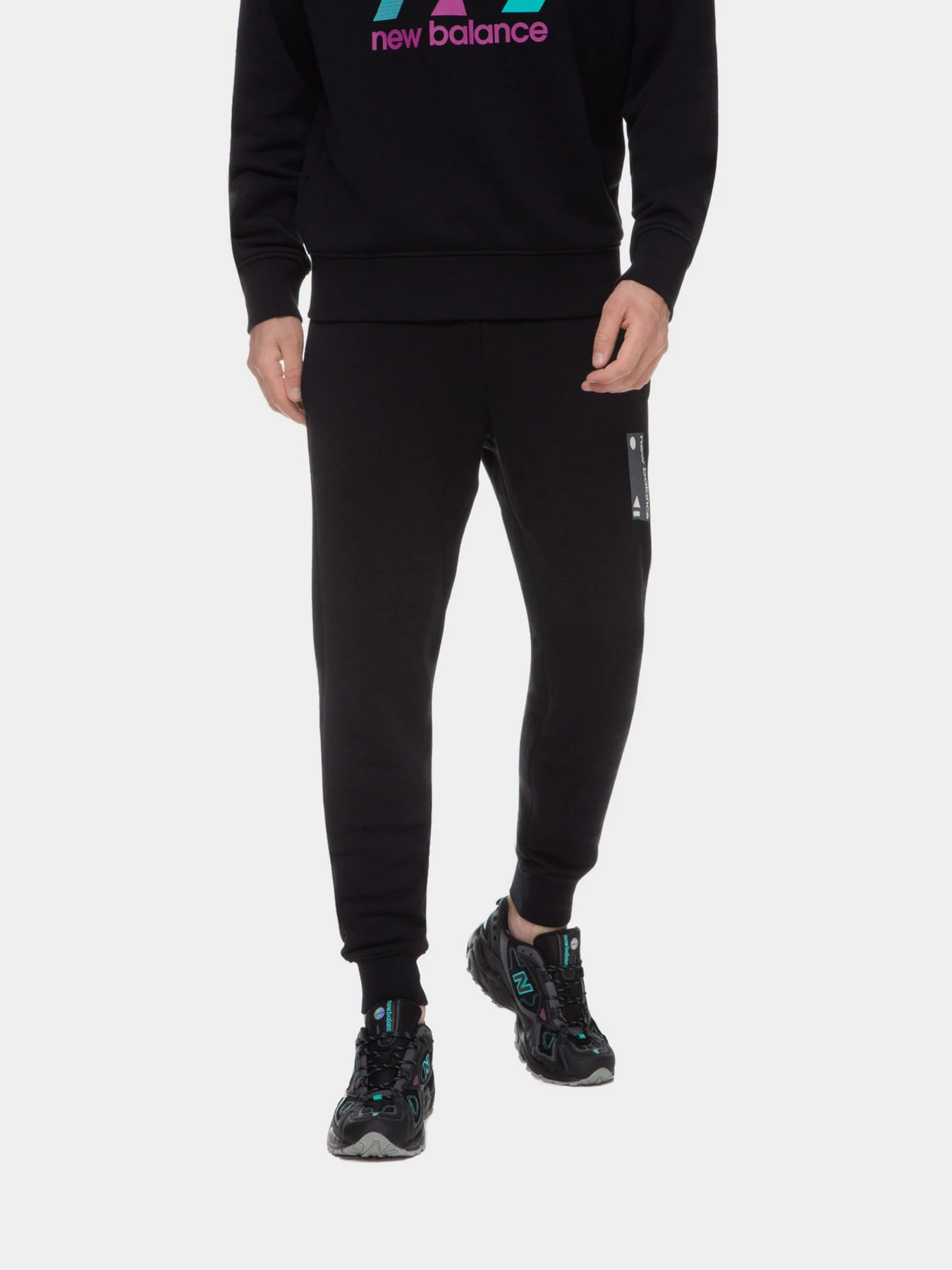 Брюки New Balance Essentials модель MP11504BK Брюки New Balance Essentials модель MP11504BK Фото