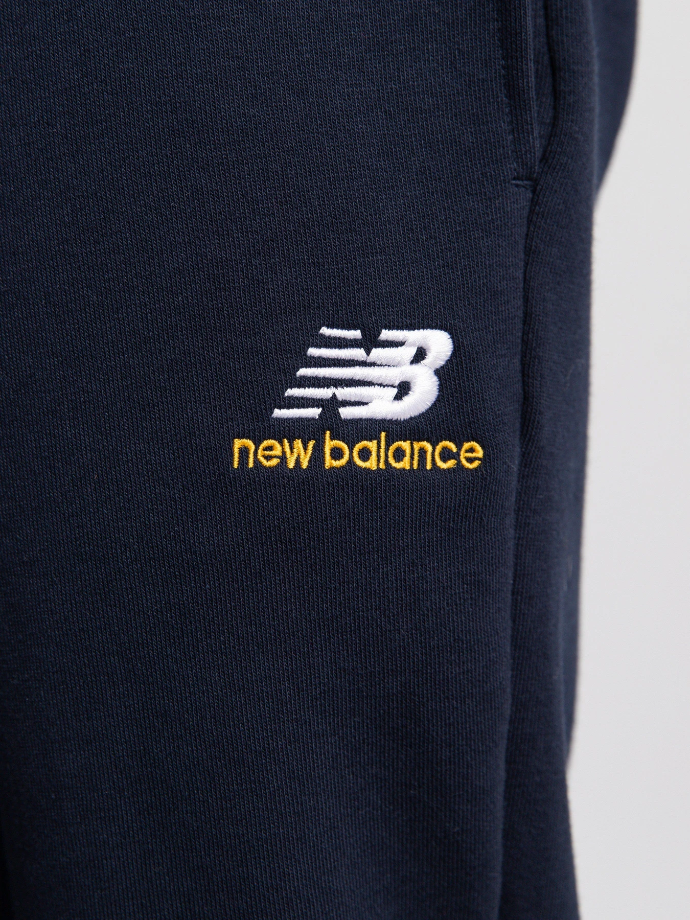 Брюки New Balance Essentials модель MP11590ECL Фото