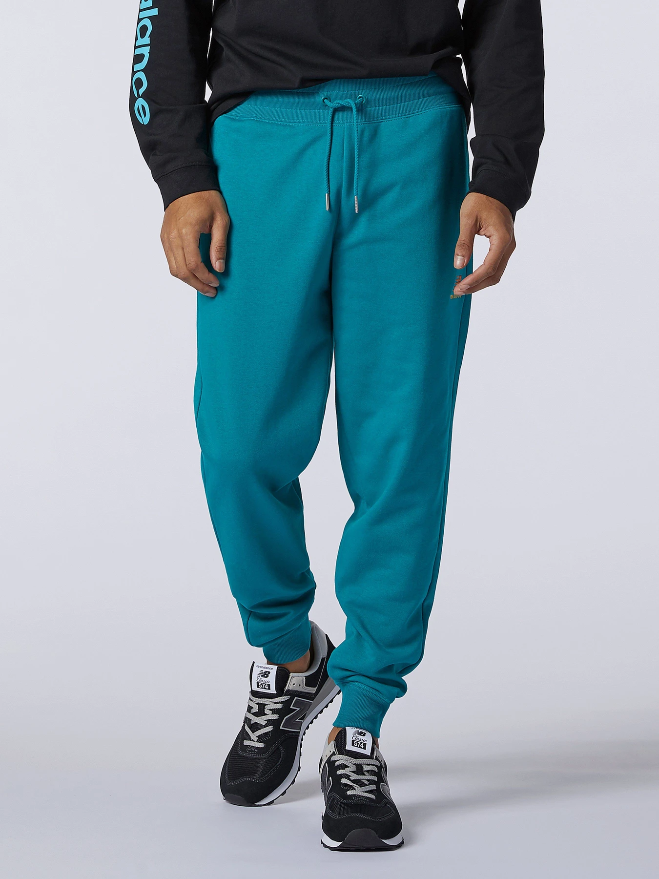Брюки New Balance Essentials модель MP11590TMT Фото