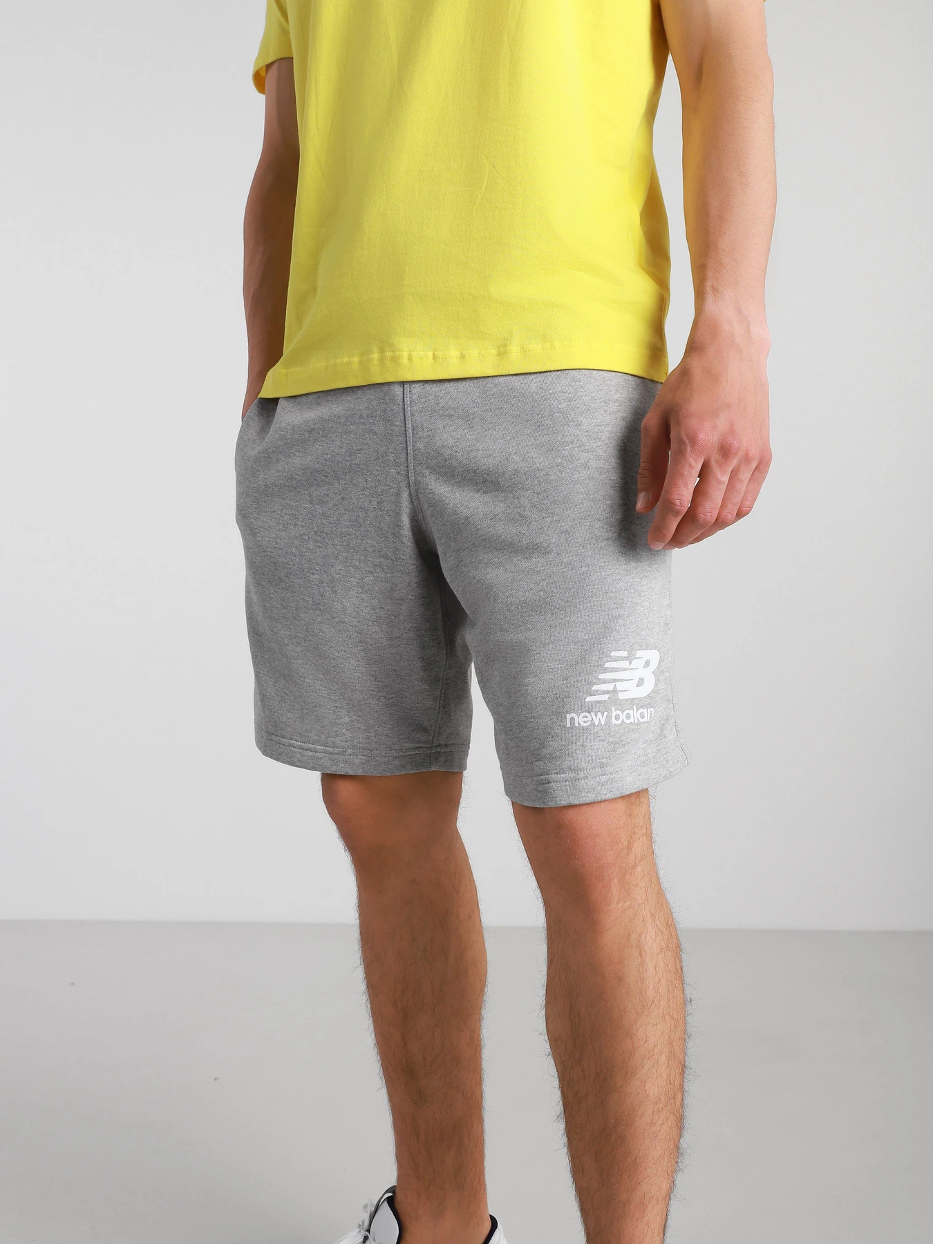 Шорты New Balance Essentials Stacked Logo модель MS03558AG Шорты New Balance Essentials Stacked Logo модель MS03558AG Фото