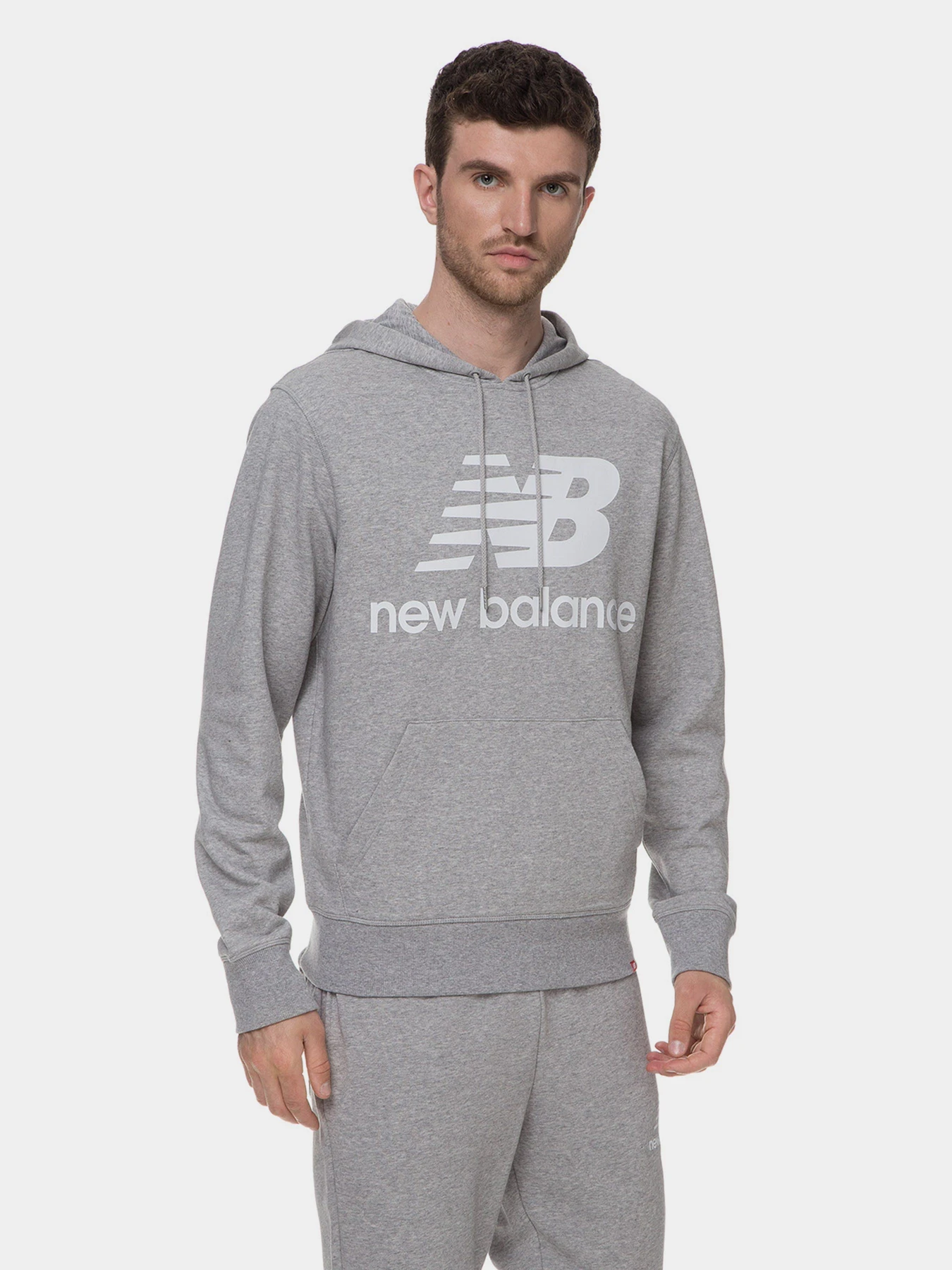 Худі та світшоти New Balance Essentials Stacked Logo модель MT03558AG Худі та світшоти New Balance Essentials Stacked Logo модель MT03558AG Фото