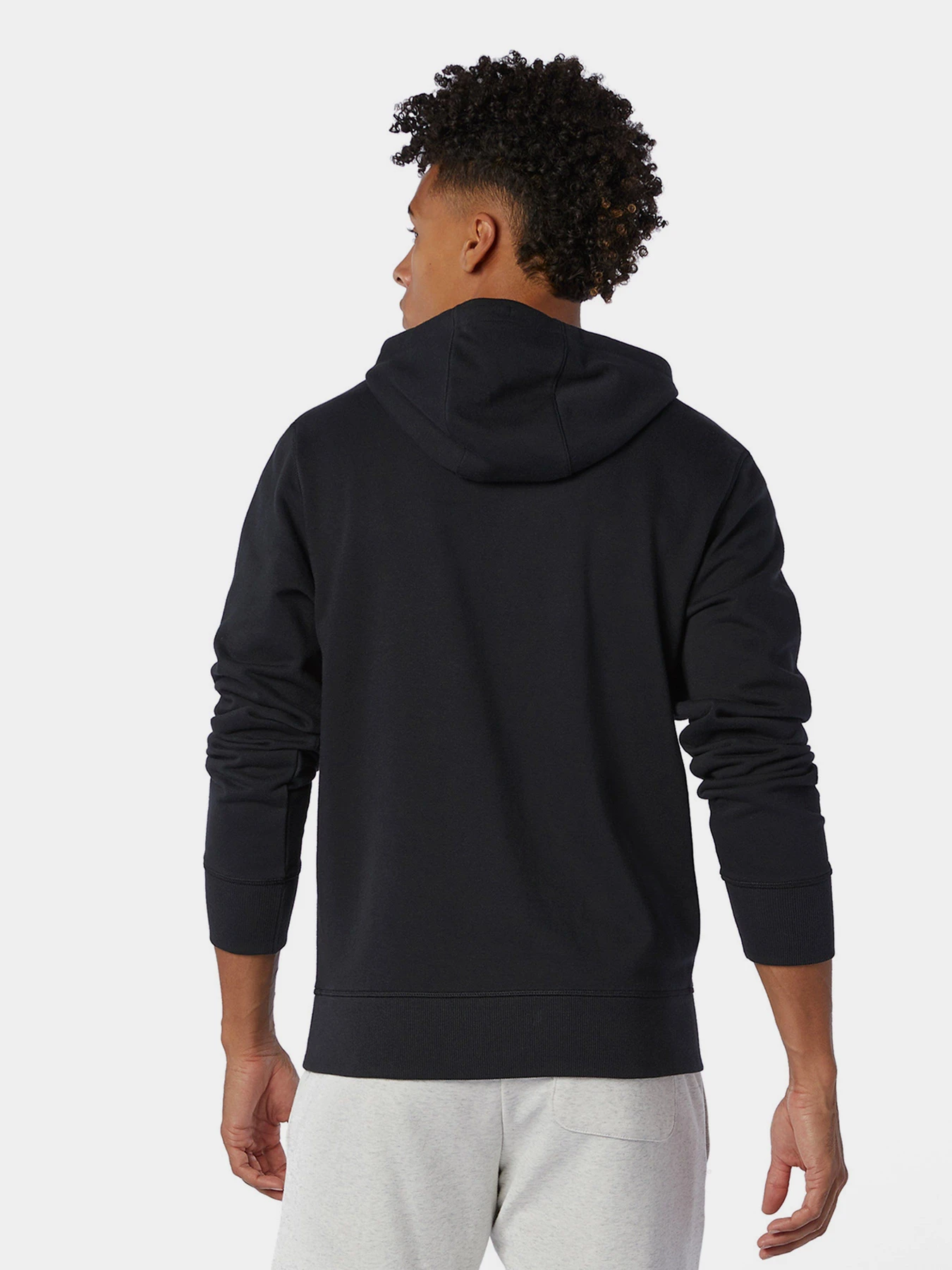Худі та світшоти New Balance Essentials Stacked Logo модель MT03558BK Худі та світшоти New Balance Essentials Stacked Logo модель MT03558BK Фото