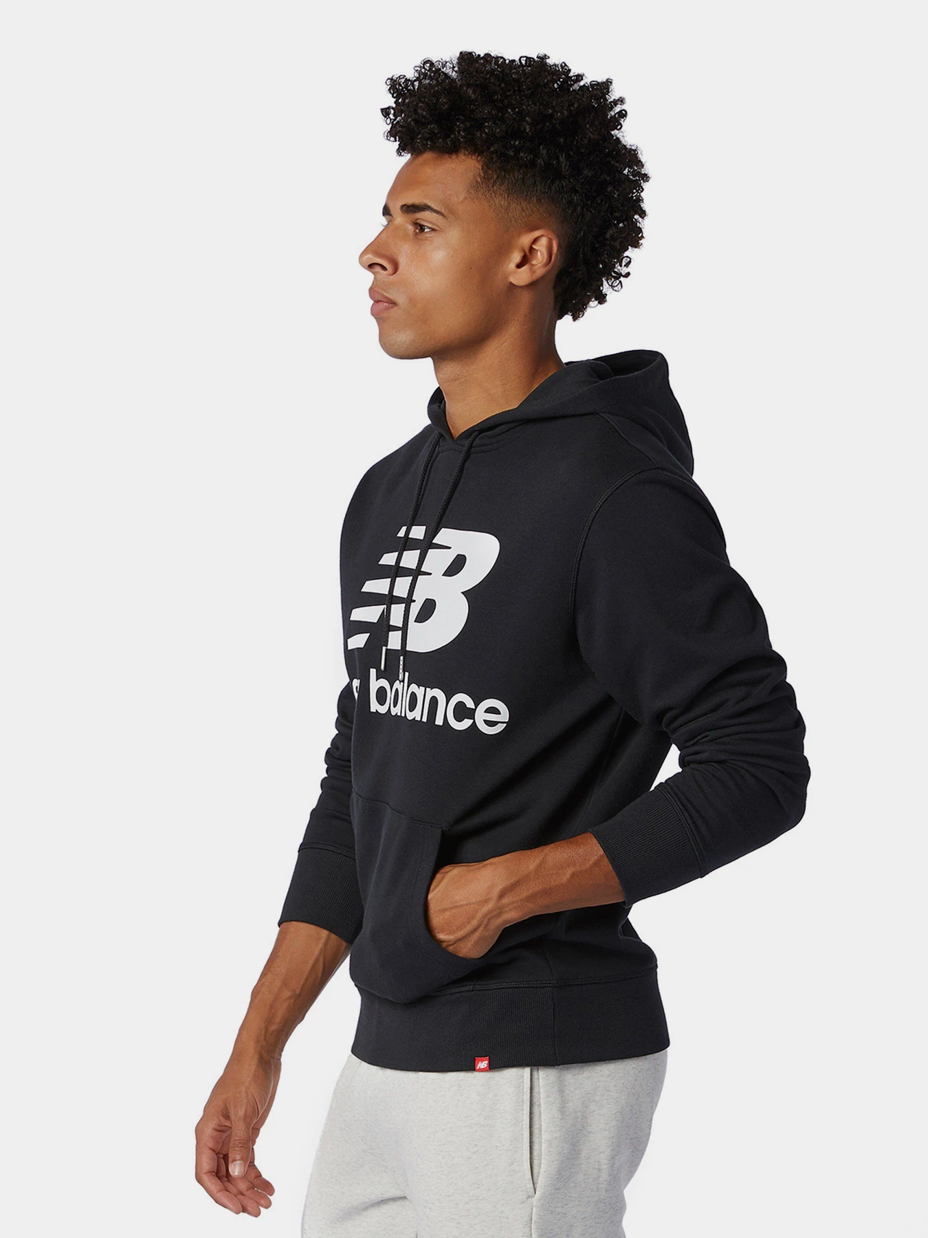 Худі та світшоти New Balance Essentials Stacked Logo модель MT03558BK Худі та світшоти New Balance Essentials Stacked Logo модель MT03558BK Фото