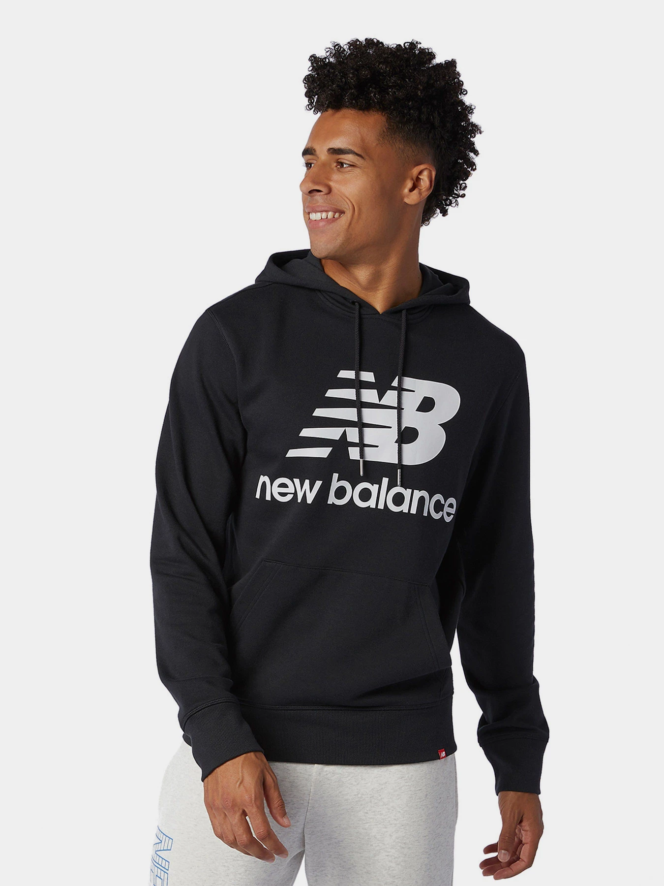Худі та світшоти New Balance Essentials Stacked Logo модель MT03558BK Худі та світшоти New Balance Essentials Stacked Logo модель MT03558BK Фото