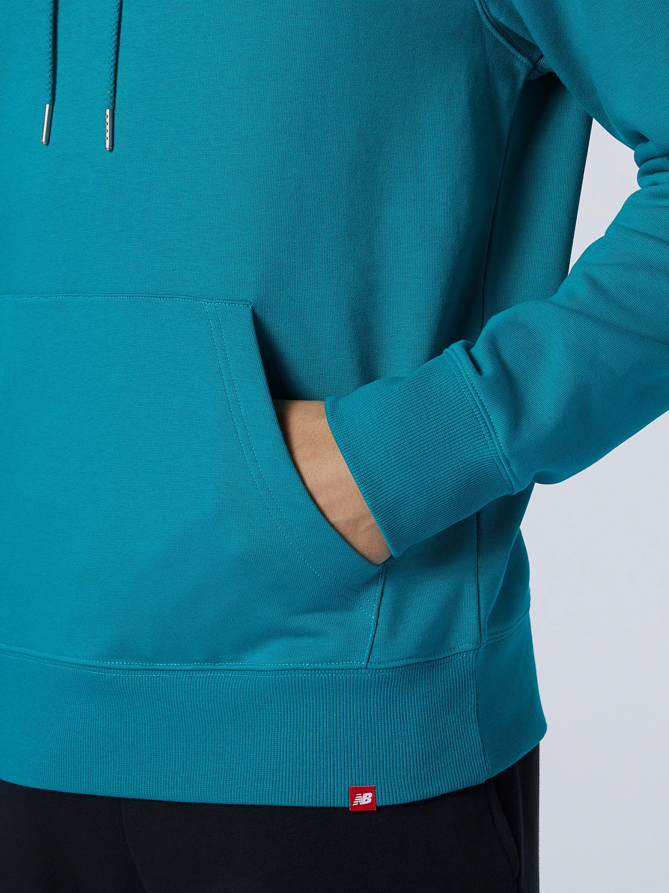 Худи и свитшоты New Balance Essentials Embriodered модель MT11550TMT Худи и свитшоты New Balance Essentials Embriodered модель MT11550TMT Фото
