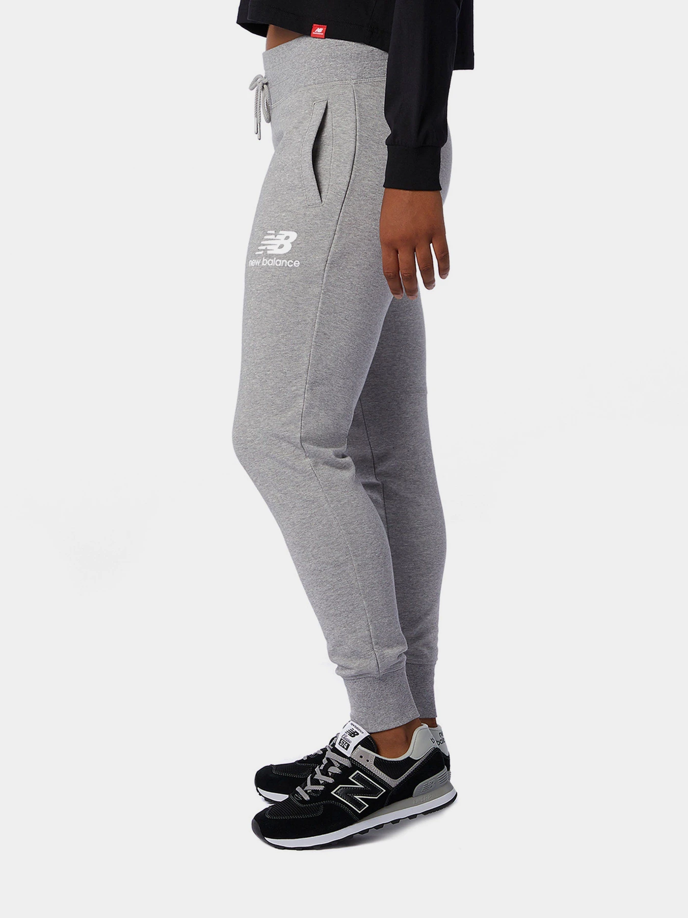 Брюки New Balance Essentials модель WP03530AG Брюки New Balance Essentials модель WP03530AG Фото