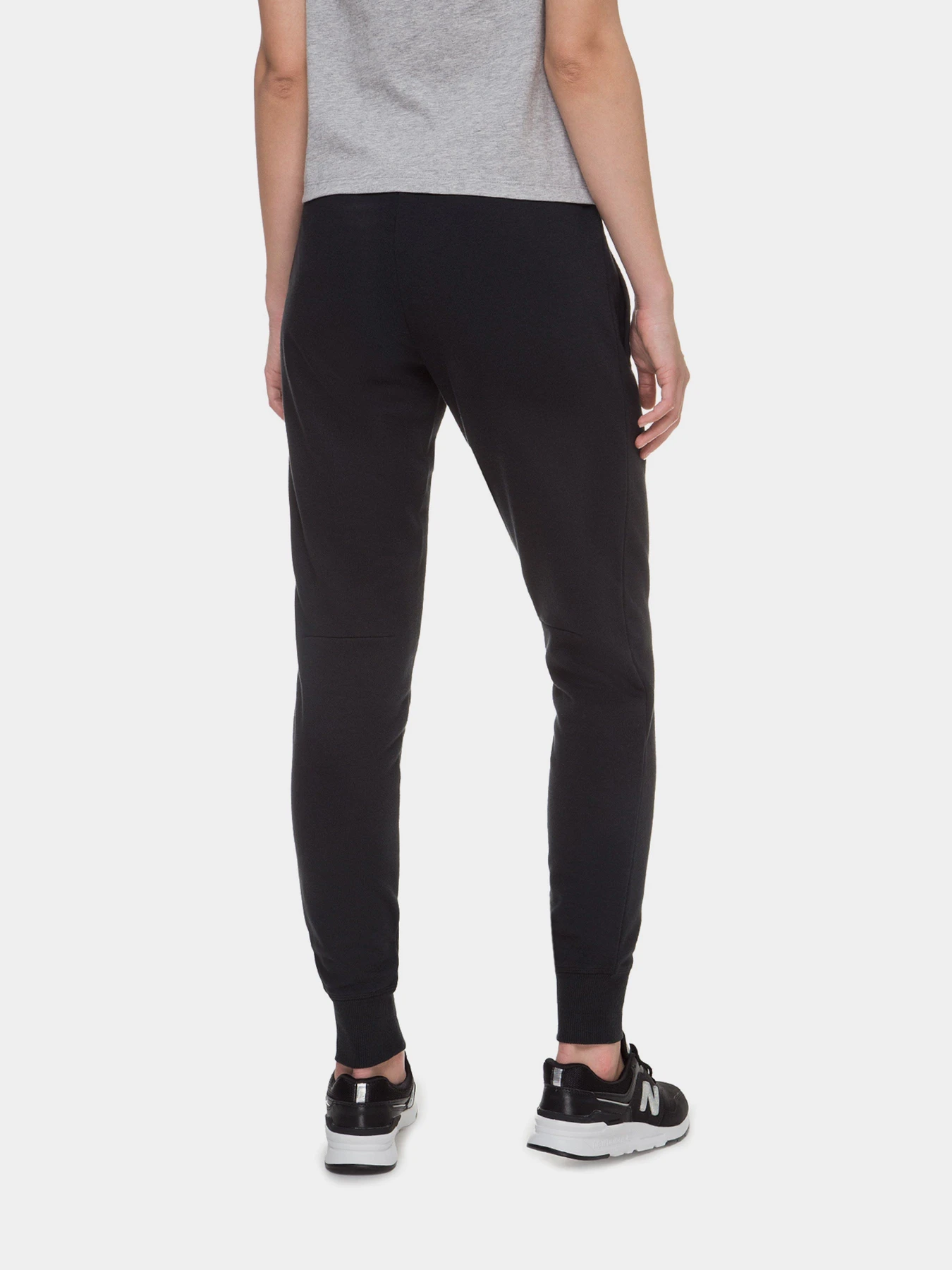 Брюки New Balance Essentials модель WP03530BK Брюки New Balance Essentials модель WP03530BK Фото