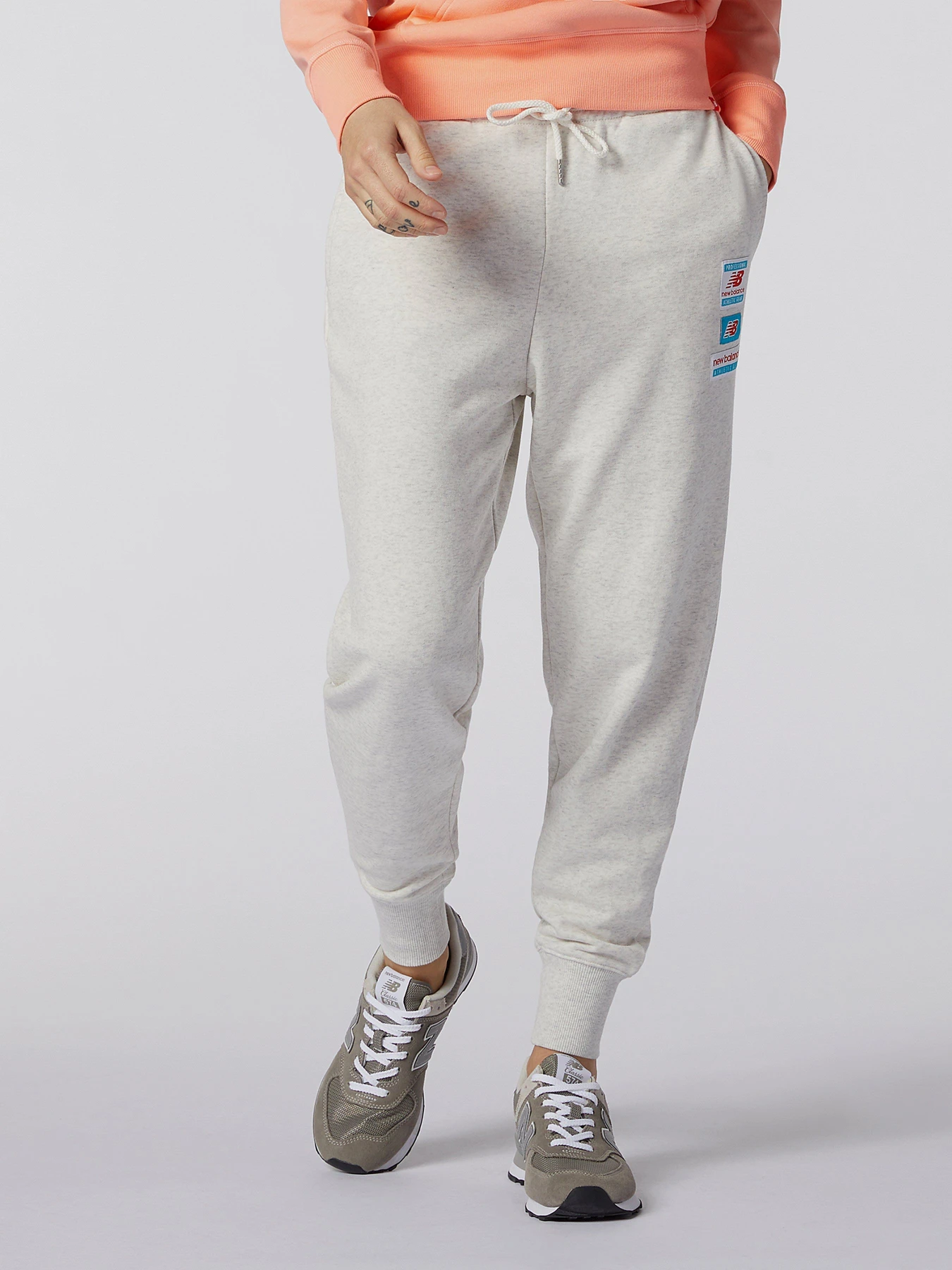 Брюки New Balance Essentials Field Day модель WP11507SAH Брюки New Balance Essentials Field Day модель WP11507SAH Фото
