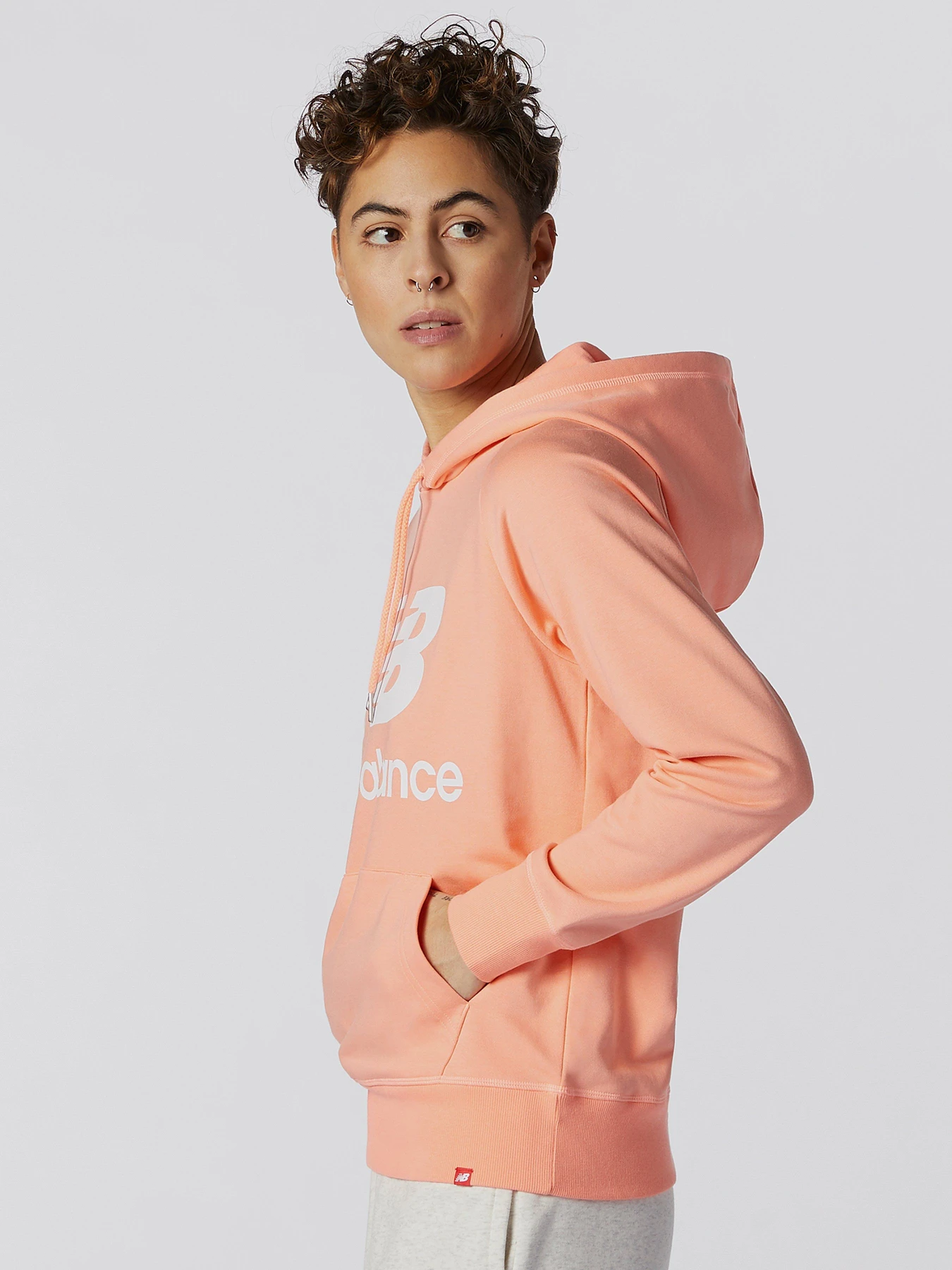 Худі та світшоти New Balance Essentials модель WT03550PPI Худі та світшоти New Balance Essentials модель WT03550PPI Фото