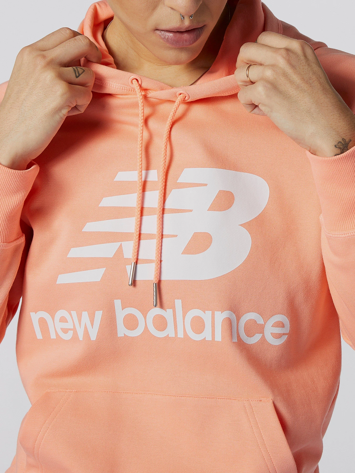 Худі та світшоти New Balance Essentials модель WT03550PPI Худі та світшоти New Balance Essentials модель WT03550PPI Фото