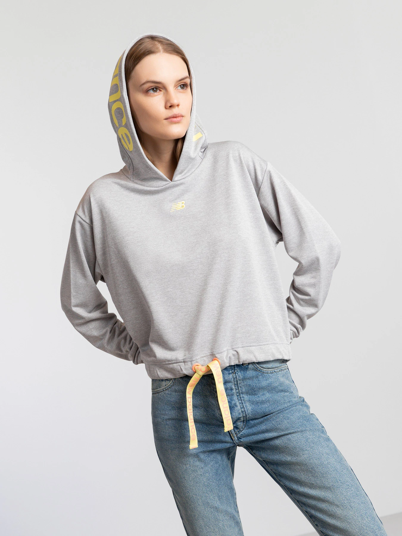 Худі та світшоти New Balance Relentless модель WT11169AG Худі та світшоти New Balance Relentless модель WT11169AG Фото