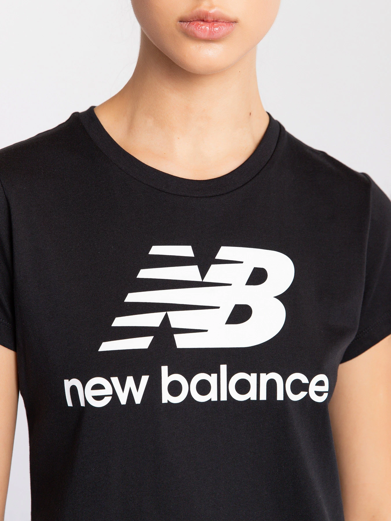 Футболки и поло New Balance Essentials Slacked Logo модель WT91546BK Фото