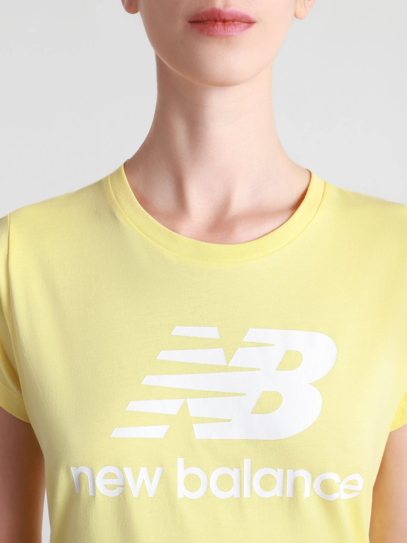Футболки и поло New Balance Essentials Slacked Logo модель WT91546LHZ Футболки и поло New Balance Essentials Slacked Logo модель WT91546LHZ Фото