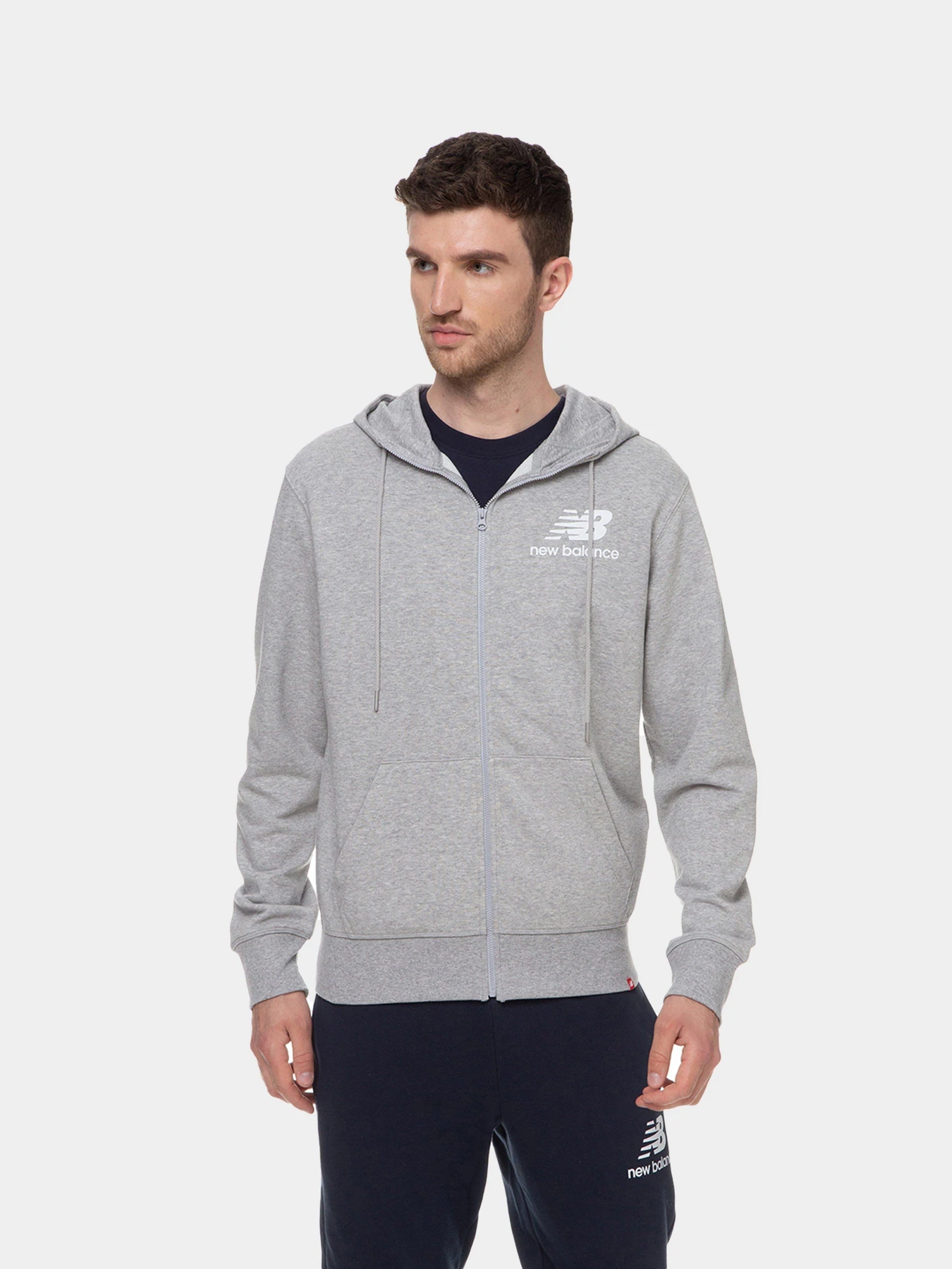 Худі та світшоти New Balance Essentials Stacked Full Zip модель MJ03558AG Худі та світшоти New Balance Essentials Stacked Full Zip модель MJ03558AG Фото