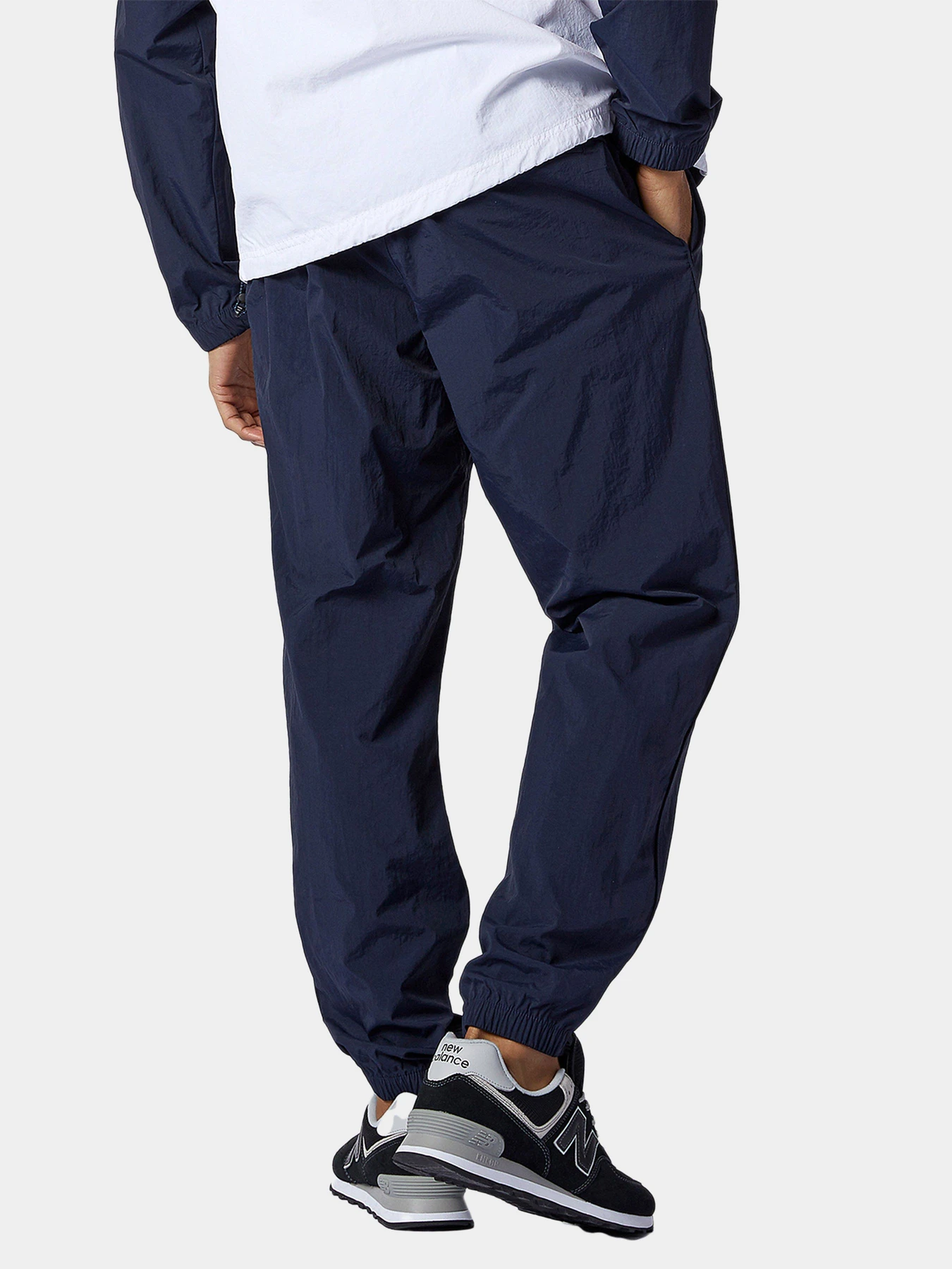 Брюки New Balance Athletics Wind модель MP11500ECL Брюки New Balance Athletics Wind модель MP11500ECL Фото