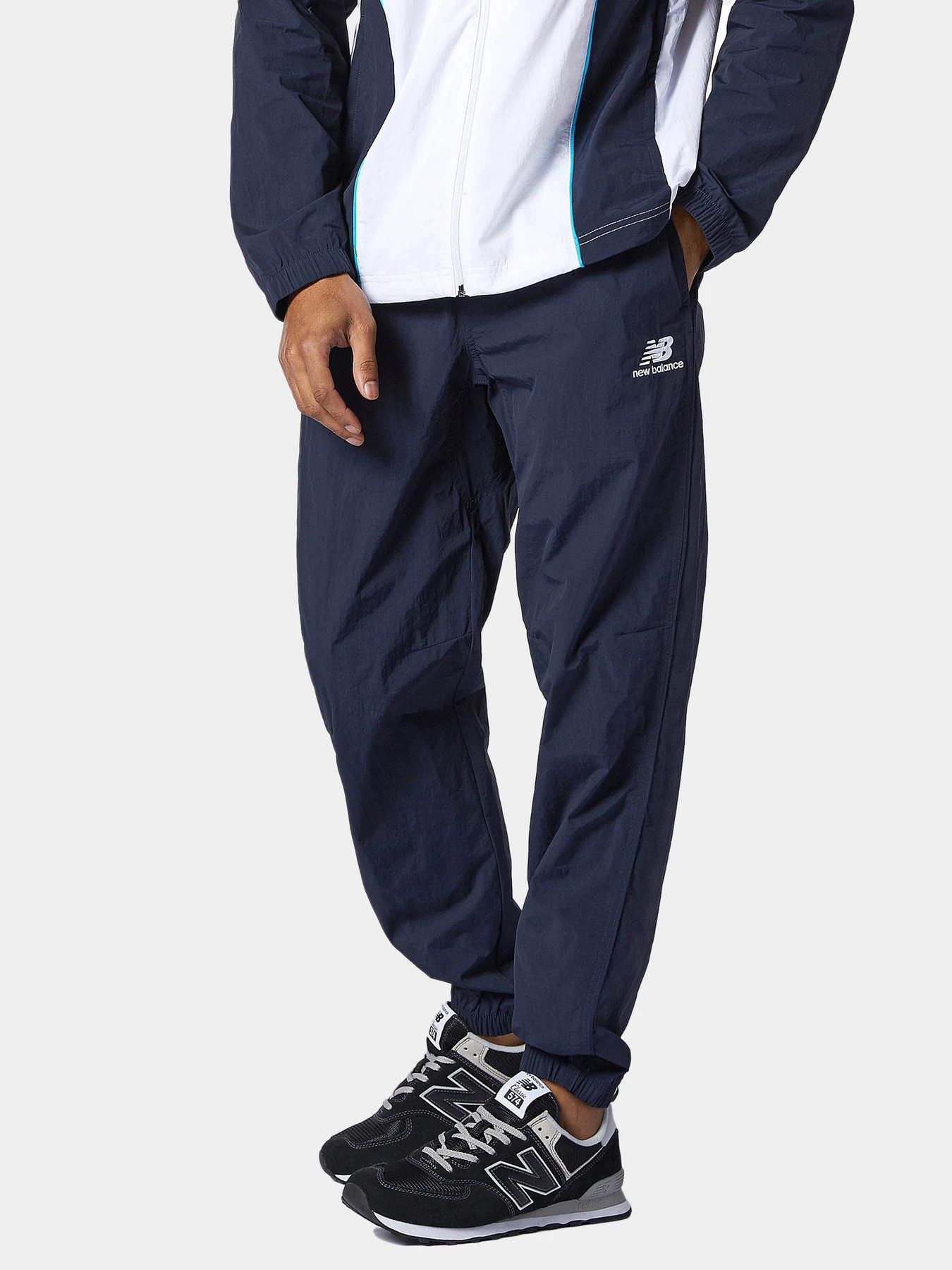Брюки New Balance Athletics Wind модель MP11500ECL Брюки New Balance Athletics Wind модель MP11500ECL Фото