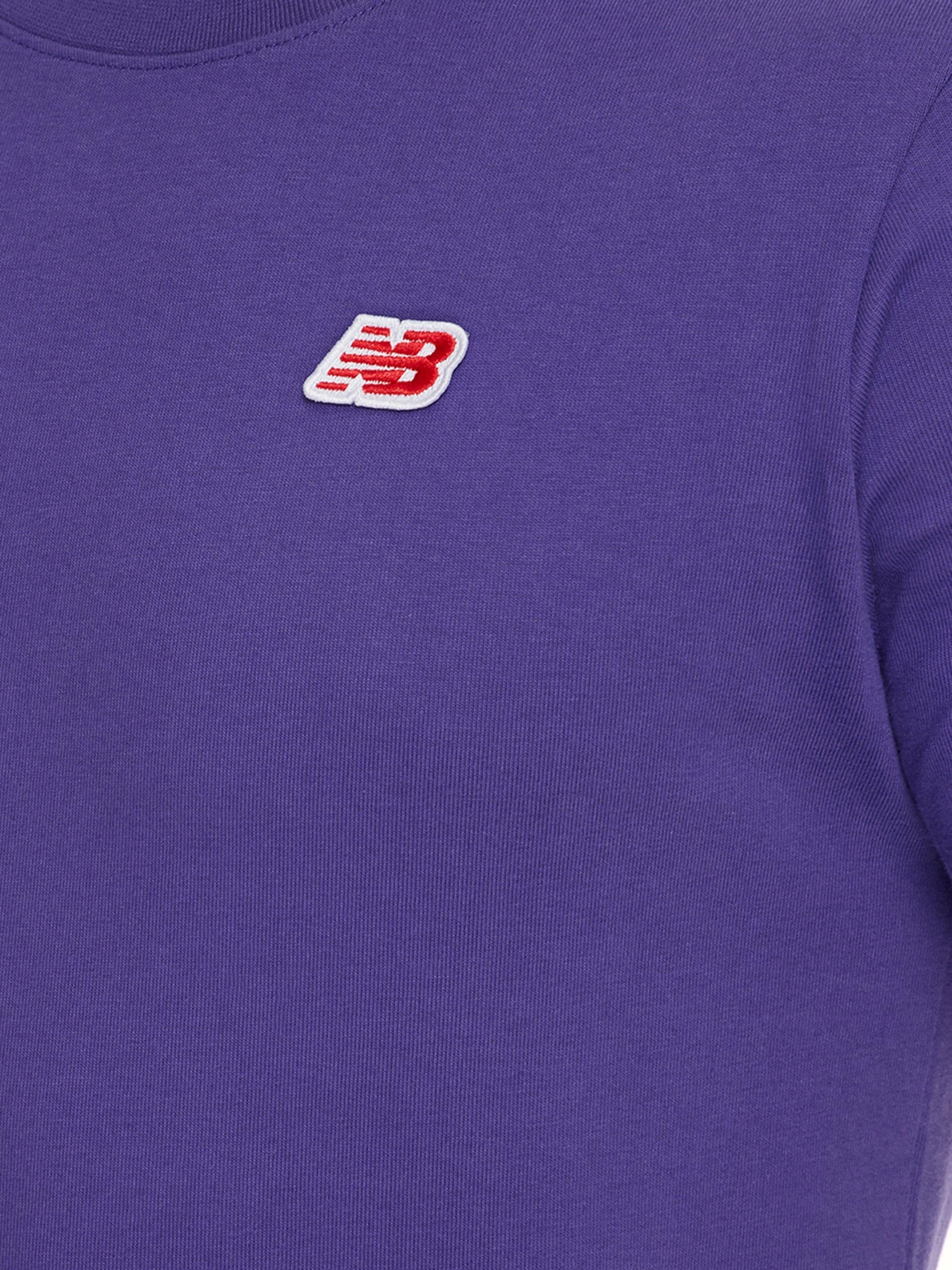 Футболки і поло New Balance Small NB Pack модель MT01660PRP Футболки і поло New Balance Small NB Pack модель MT01660PRP Фото