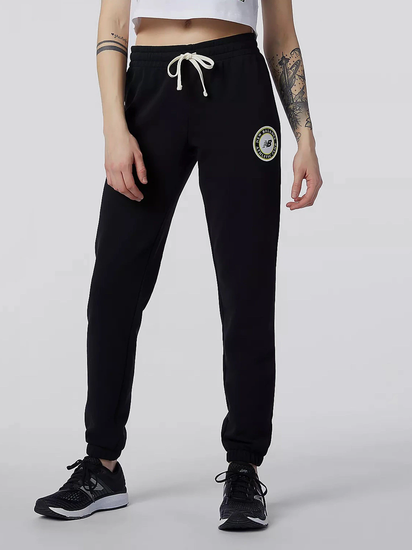 Брюки New Balance Essentials Athletic Club модель WP13503BK Брюки New Balance Essentials Athletic Club модель WP13503BK Фото