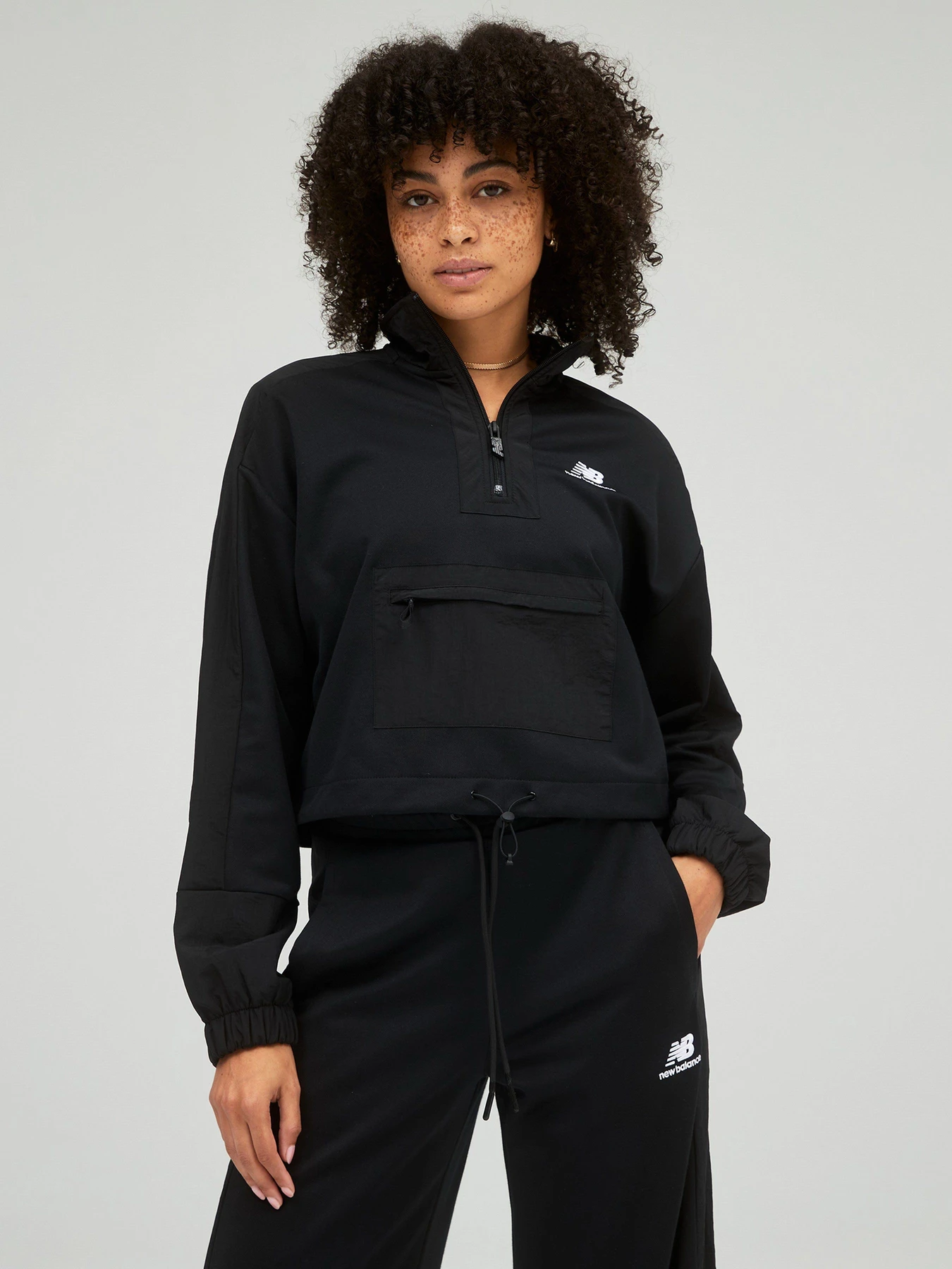 Куртки и дубленки New Balance Athletics Amplified Qtr Zip модель WJ21501BK Фото
