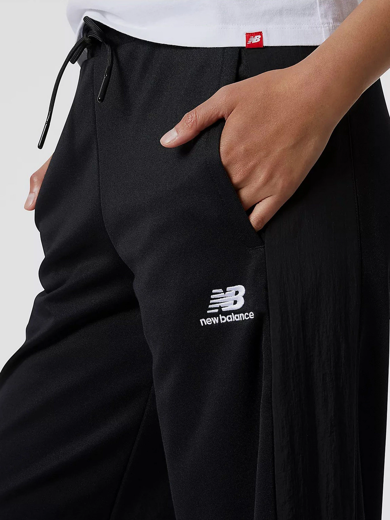Брюки New Balance Athletics модель WP21502BK Фото