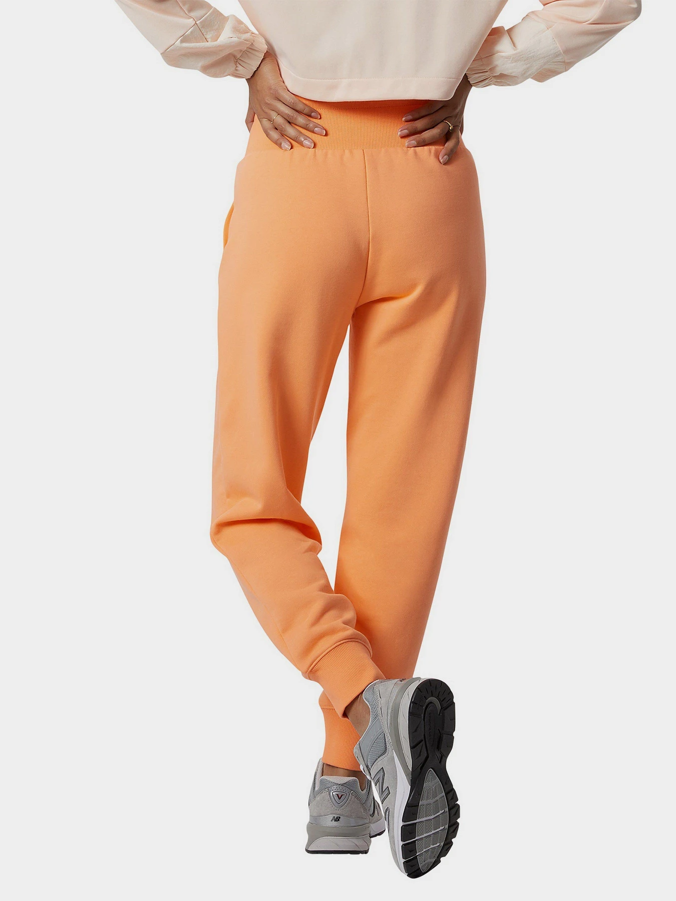 Брюки New Balance Athletics Amplified Fleece модель WP21503PGZ Брюки New Balance Athletics Amplified Fleece модель WP21503PGZ Фото