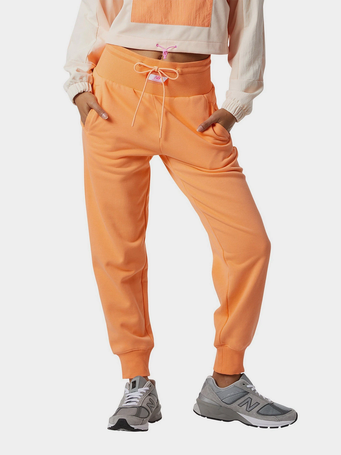 Брюки New Balance Athletics Amplified Fleece модель WP21503PGZ Брюки New Balance Athletics Amplified Fleece модель WP21503PGZ Фото