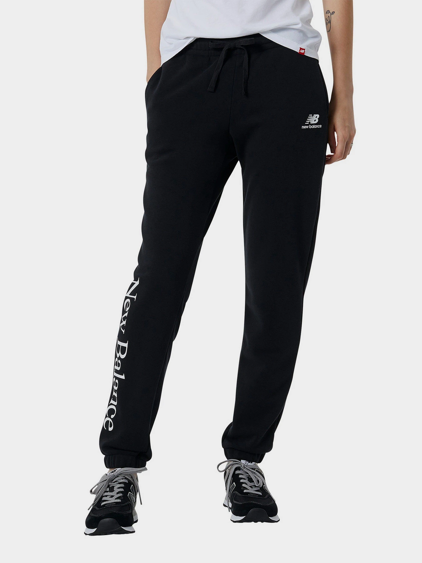 Брюки New Balance Essentials Celebrate Fleece модель WP21508BK Брюки New Balance Essentials Celebrate Fleece модель WP21508BK Фото