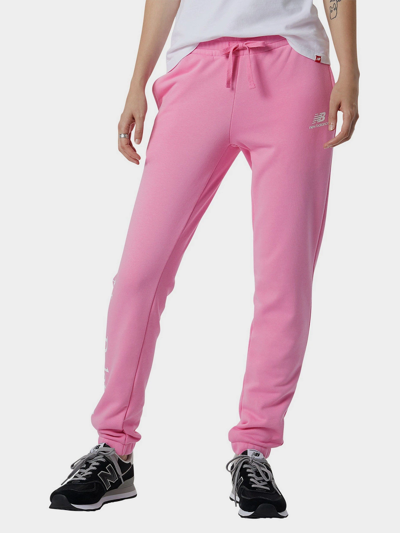Брюки New Balance Essentials Celebrate Fleece модель WP21508VPK Брюки New Balance Essentials Celebrate Fleece модель WP21508VPK Фото