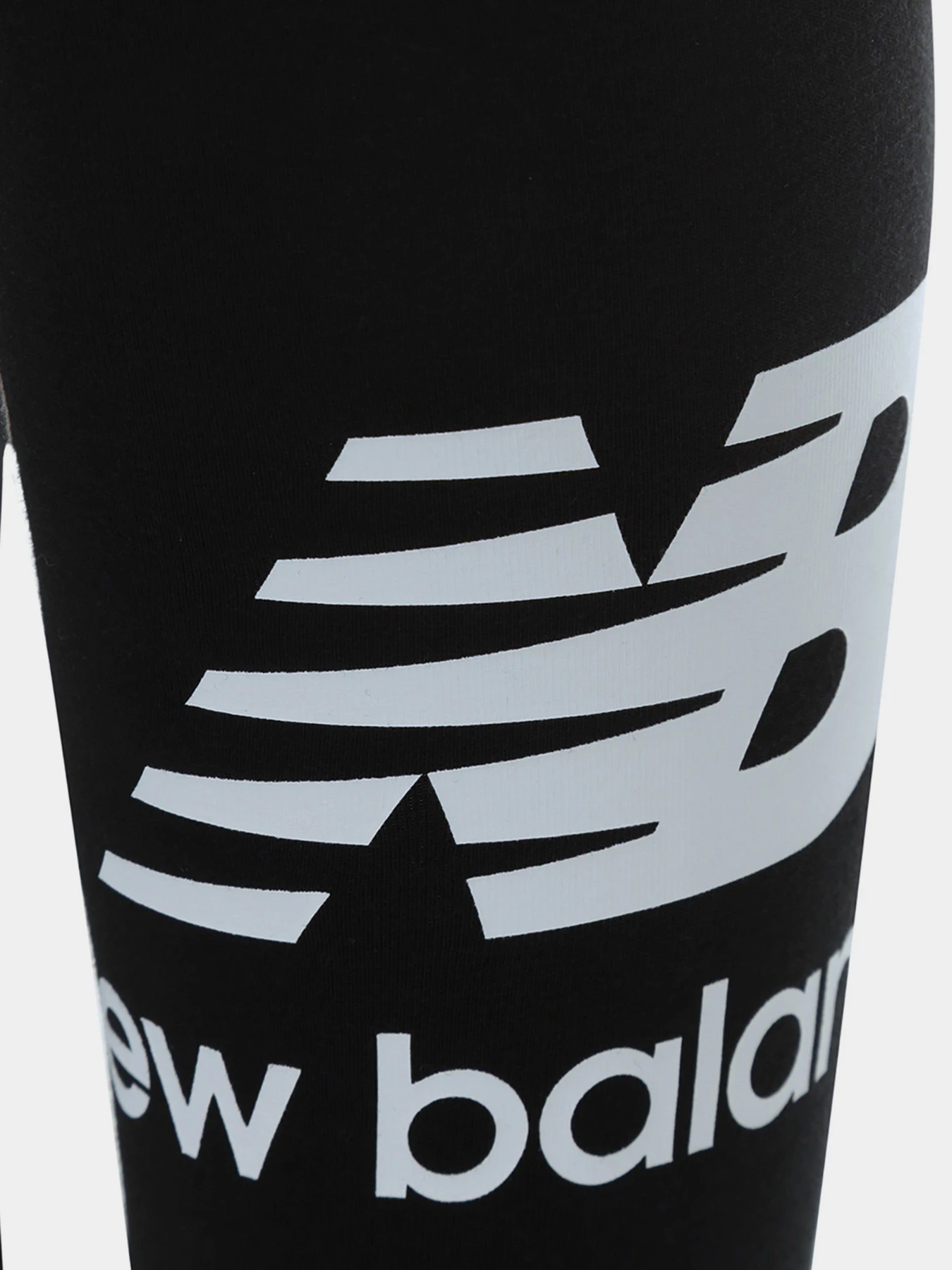 Брюки New Balance Essentials Stacked модель WP21509BK Брюки New Balance Essentials Stacked модель WP21509BK Фото