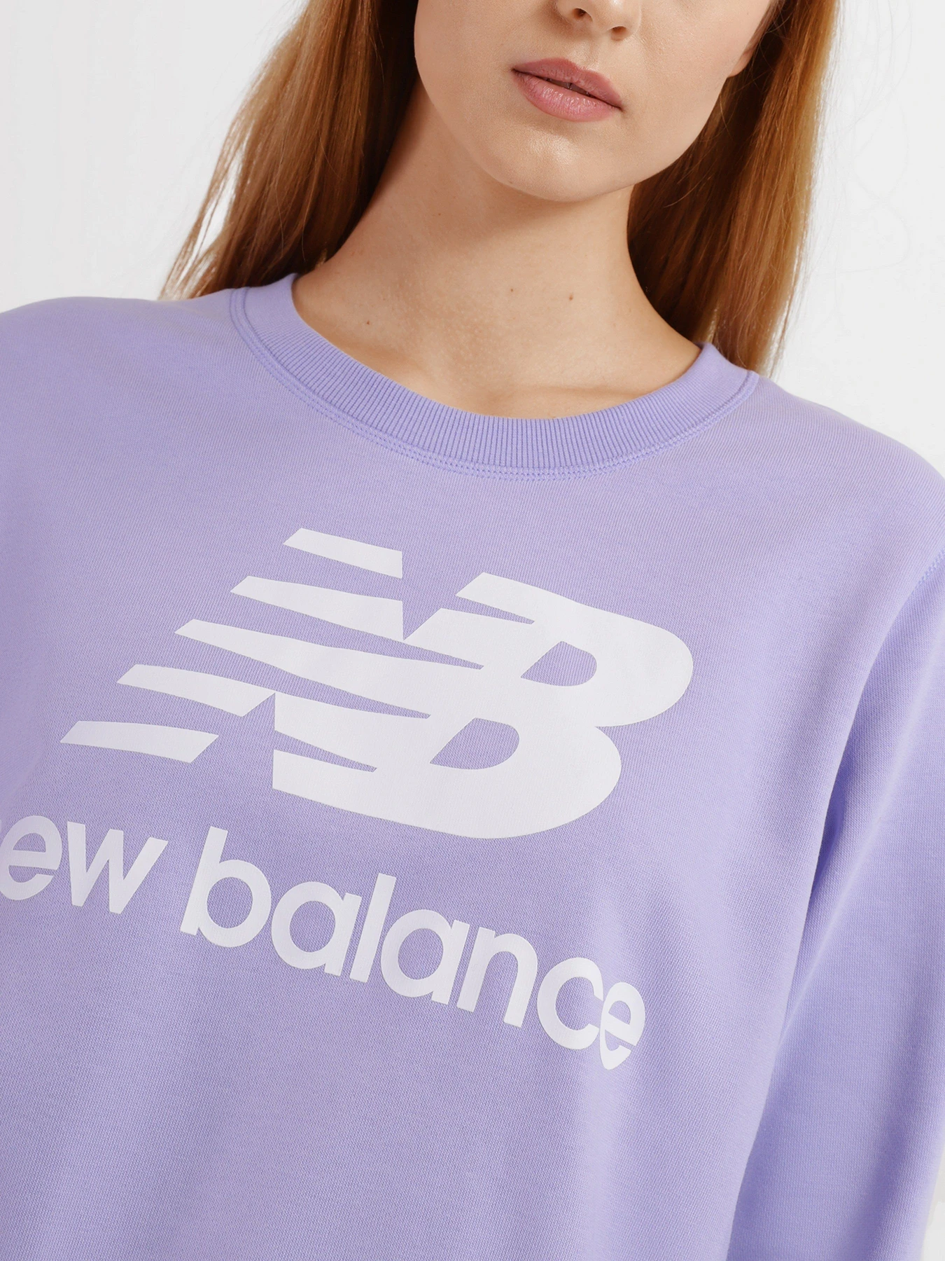 Худи и свитшоты New Balance Essentials Crew модель WT03551VVO Худи и свитшоты New Balance Essentials Crew модель WT03551VVO Фото