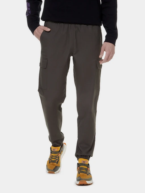 Штани New Balance Athletics Woven модель MP13501COG Фото