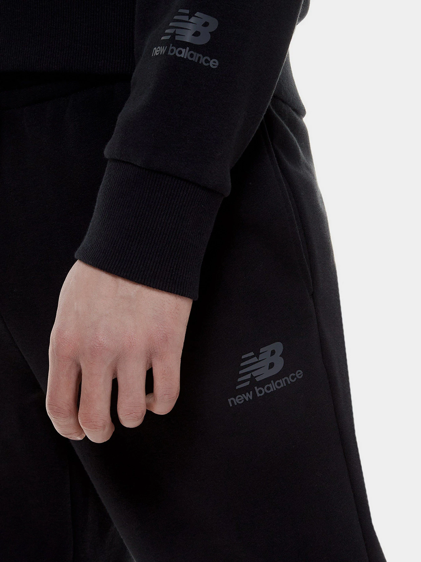 Брюки New Balance Essentials Celebrate модель MP21503BK Брюки New Balance Essentials Celebrate модель MP21503BK Фото