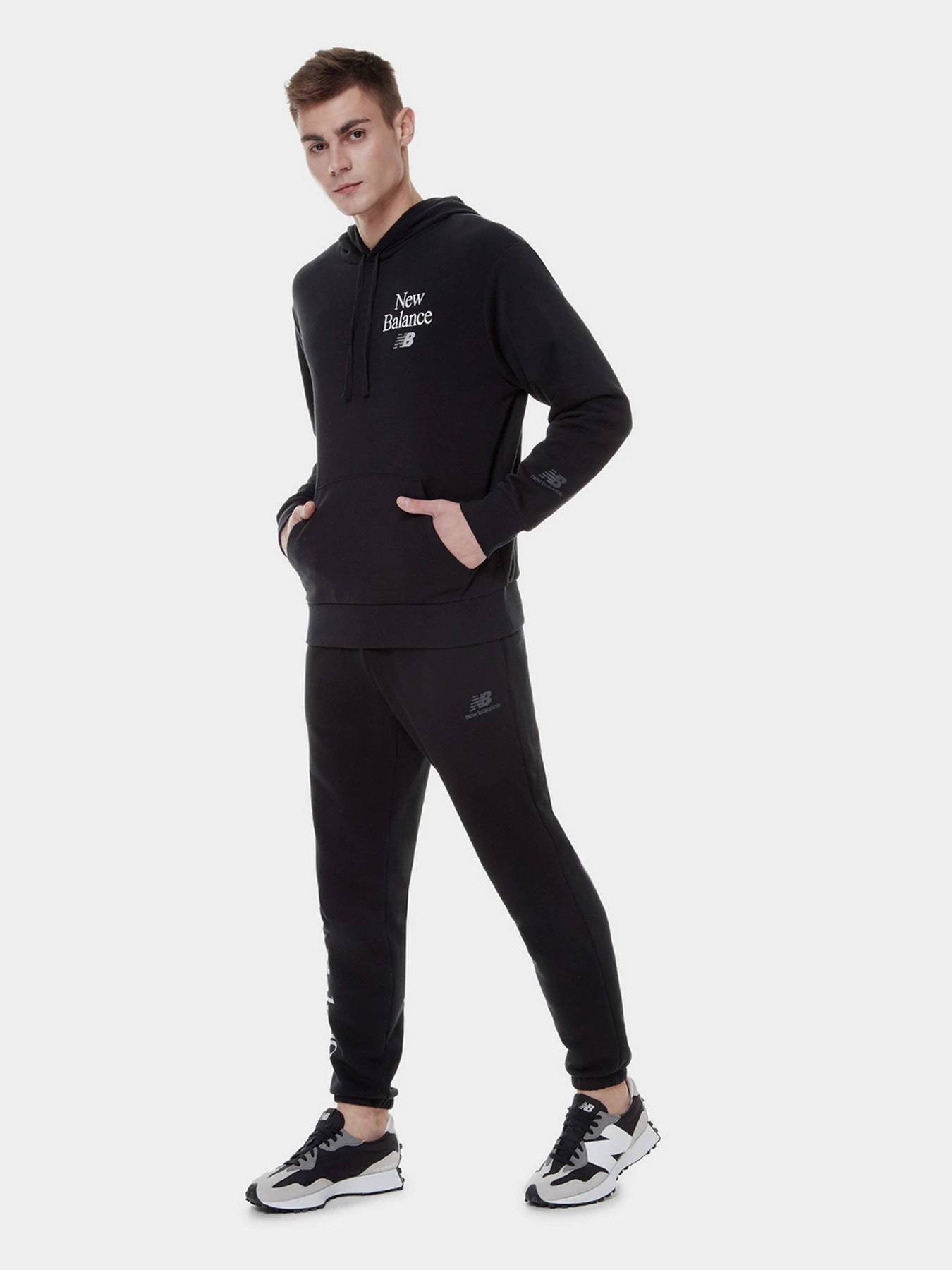 Брюки New Balance Essentials Celebrate модель MP21503BK Брюки New Balance Essentials Celebrate модель MP21503BK Фото