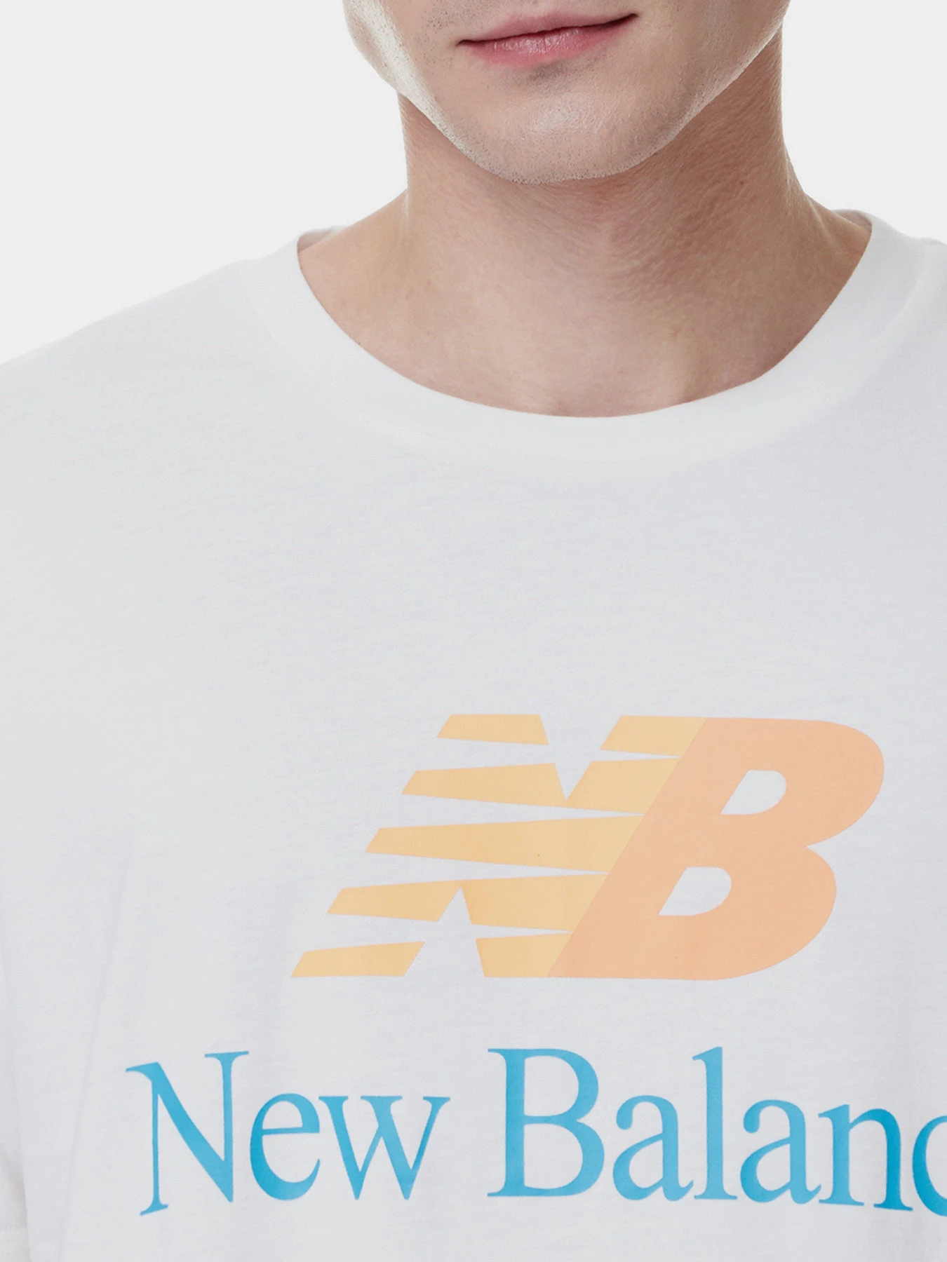 Футболки и поло New Balance Essentials Celebrate модель MT21529WT Футболки и поло New Balance Essentials Celebrate модель MT21529WT Фото