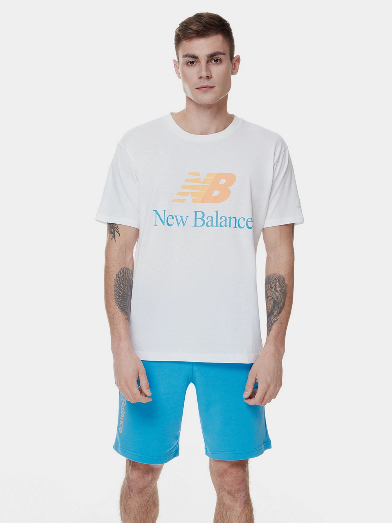 Футболки и поло New Balance Essentials Celebrate модель MT21529WT Футболки и поло New Balance Essentials Celebrate модель MT21529WT Фото