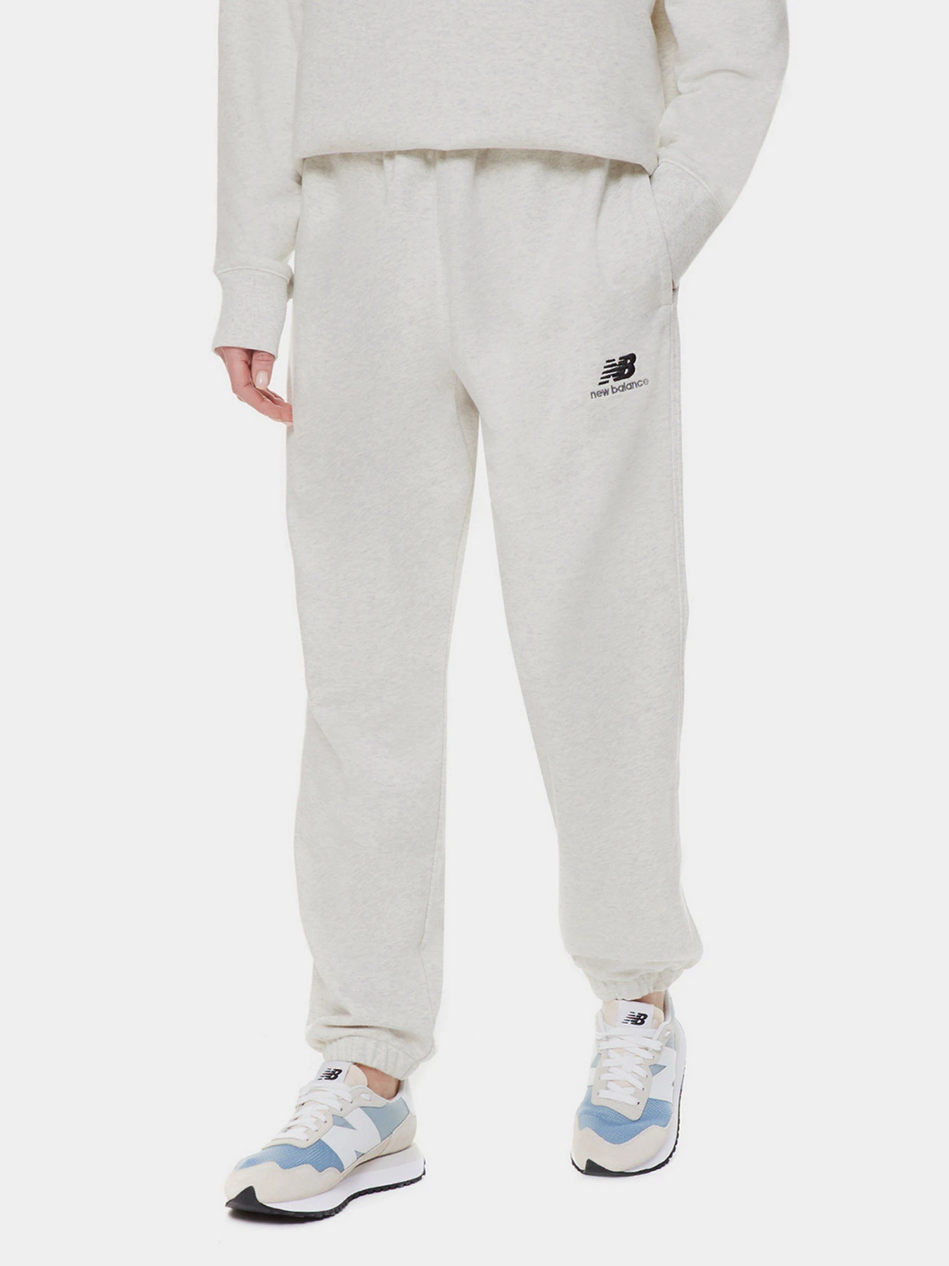 Брюки New Balance Essentials модель UP21500SAH Брюки New Balance Essentials модель UP21500SAH Фото