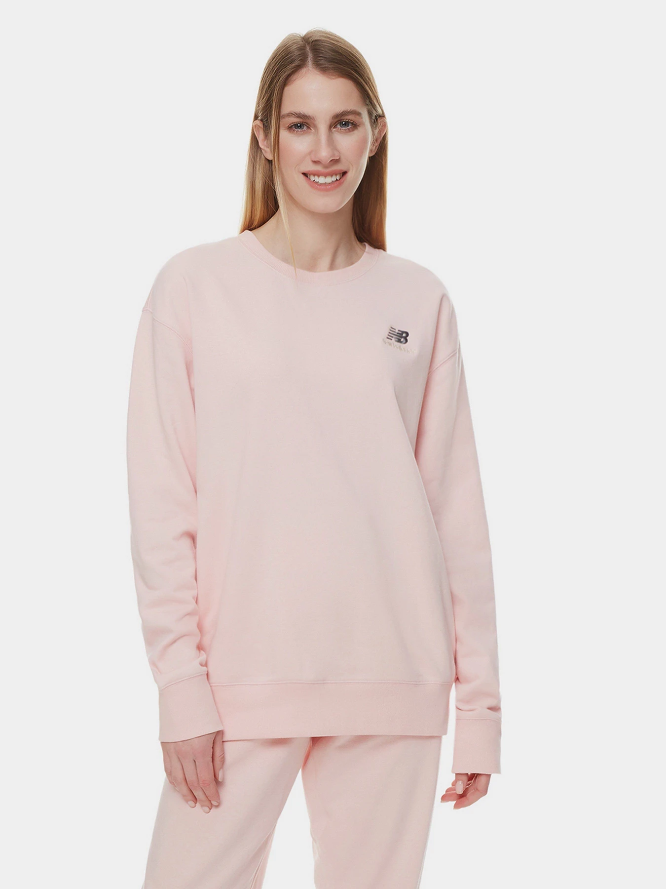 Худі та світшоти New Balance Essentials модель UT21501PIE Худі та світшоти New Balance Essentials модель UT21501PIE Фото