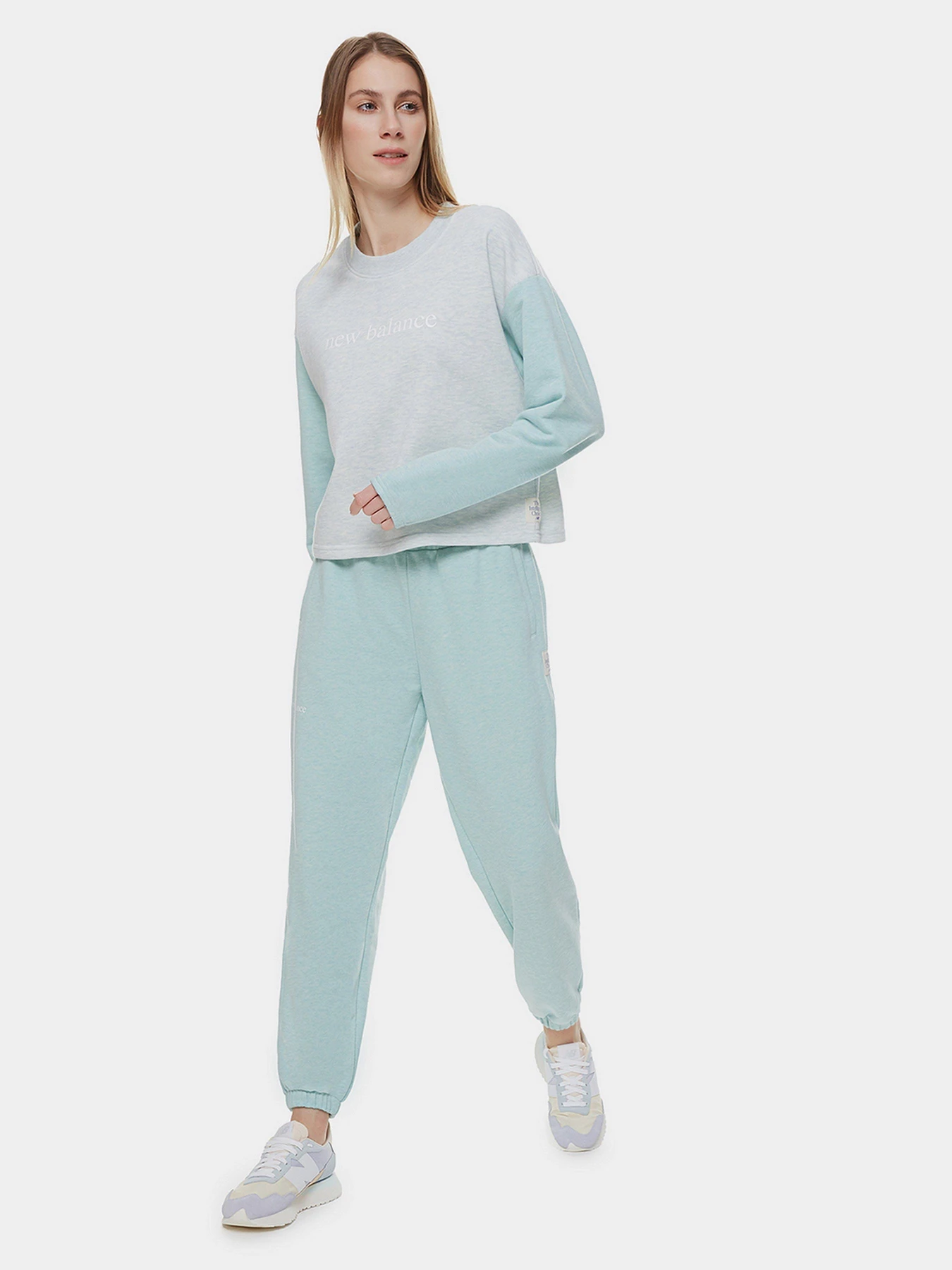 Брюки New Balance Essentials Balanced модель WP21554SH1 Брюки New Balance Essentials Balanced модель WP21554SH1 Фото