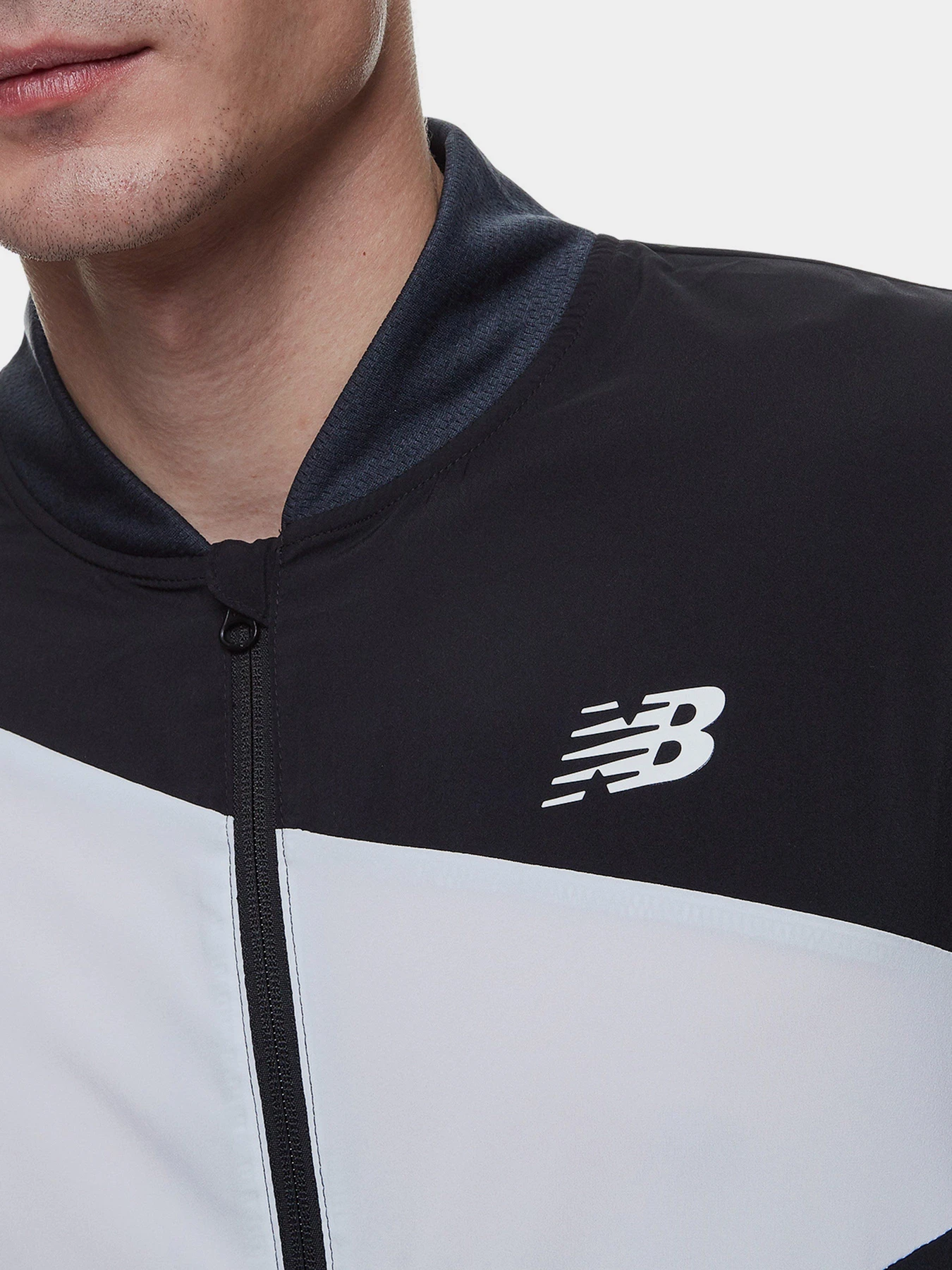 Куртки и дубленки New Balance Tenacity Stretch Woven модель MJ21010BKW Куртки и дубленки New Balance Tenacity Stretch Woven модель MJ21010BKW Фото