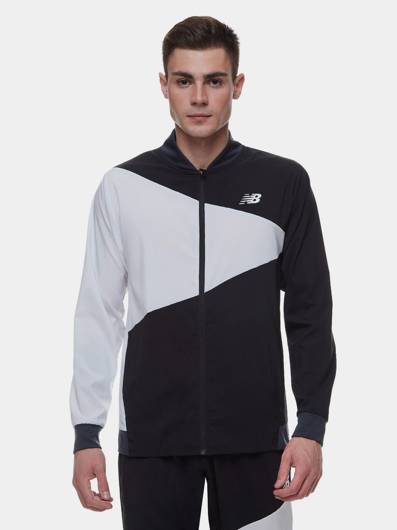 Куртки и дубленки New Balance Tenacity Stretch Woven модель MJ21010BKW Куртки и дубленки New Balance Tenacity Stretch Woven модель MJ21010BKW Фото