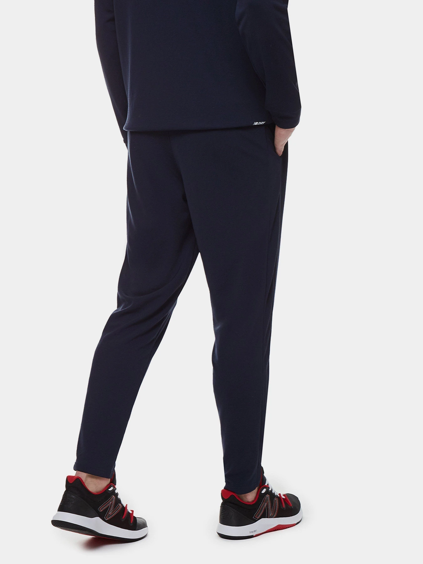 Штани New Balance NB Tech Training Knit Track модель MP21033ECL Штани New Balance NB Tech Training Knit Track модель MP21033ECL Фото