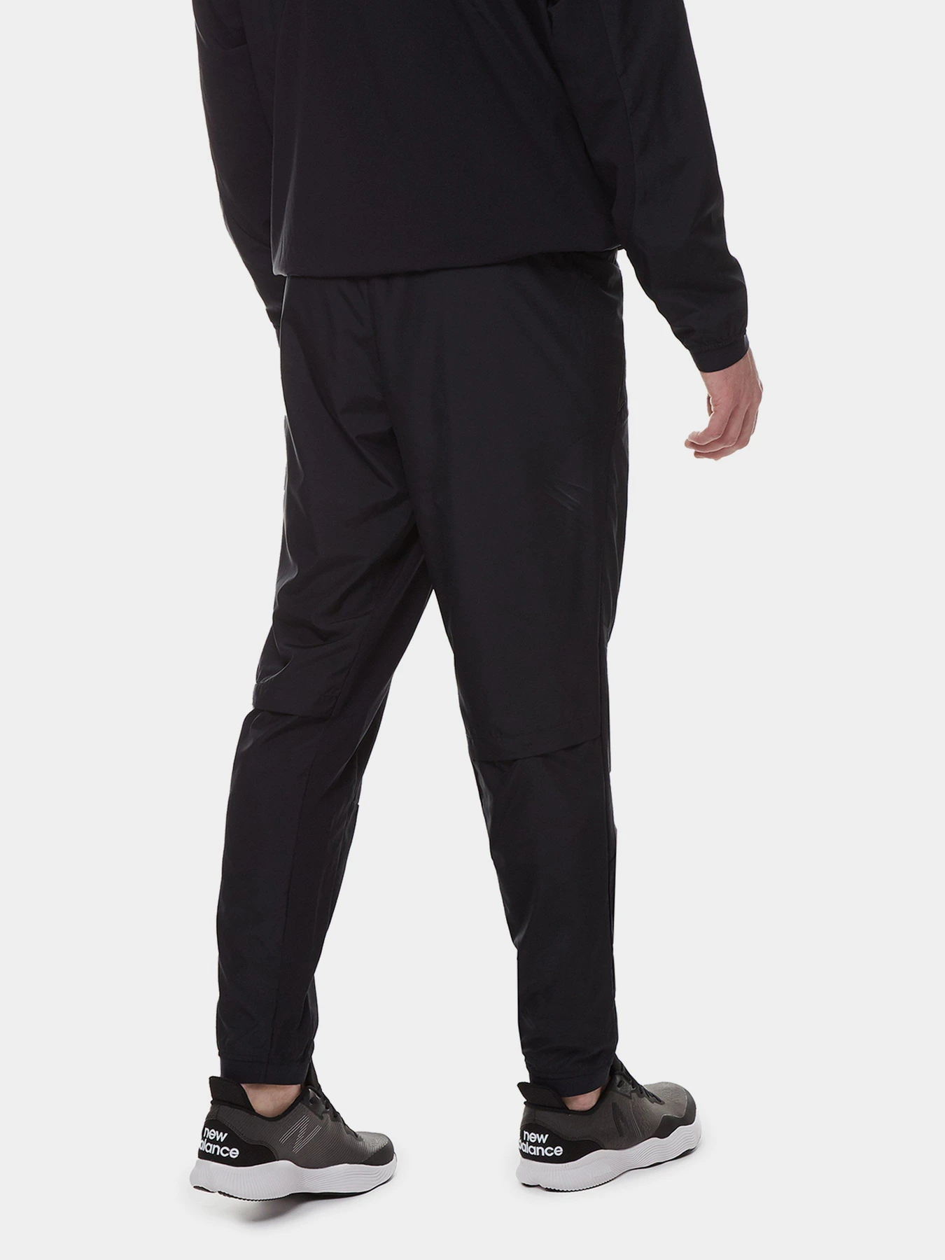 Штани New Balance R.W.Tech Lightweight Woven модель MP21049BK Штани New Balance R.W.Tech Lightweight Woven модель MP21049BK Фото