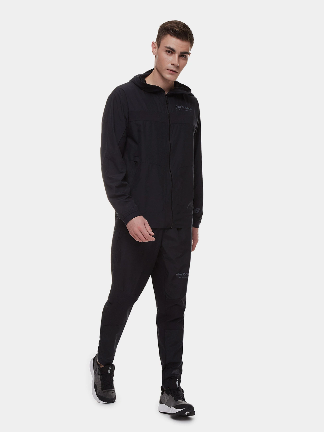 Штани New Balance R.W.Tech Lightweight Woven модель MP21049BK Штани New Balance R.W.Tech Lightweight Woven модель MP21049BK Фото