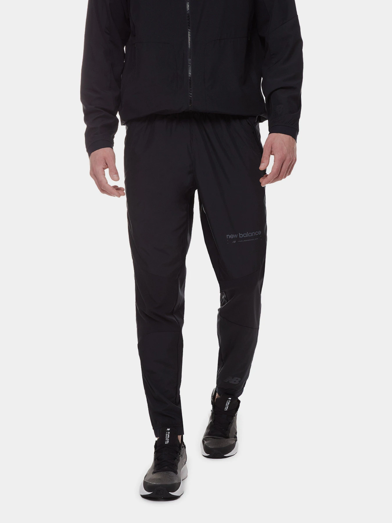 Штани New Balance R.W.Tech Lightweight Woven модель MP21049BK Штани New Balance R.W.Tech Lightweight Woven модель MP21049BK Фото