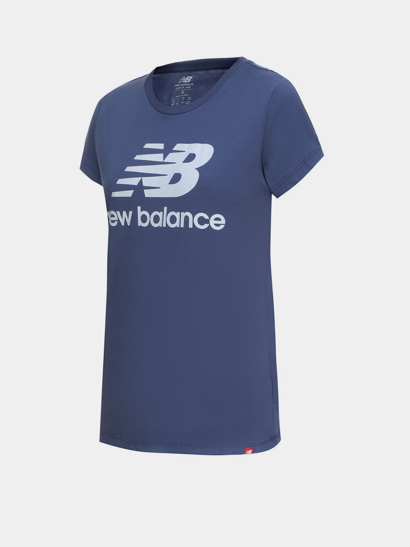 Футболки и поло New Balance NB Essentials Stacked Logo модель WT91546NSY Футболки и поло New Balance NB Essentials Stacked Logo модель WT91546NSY Фото