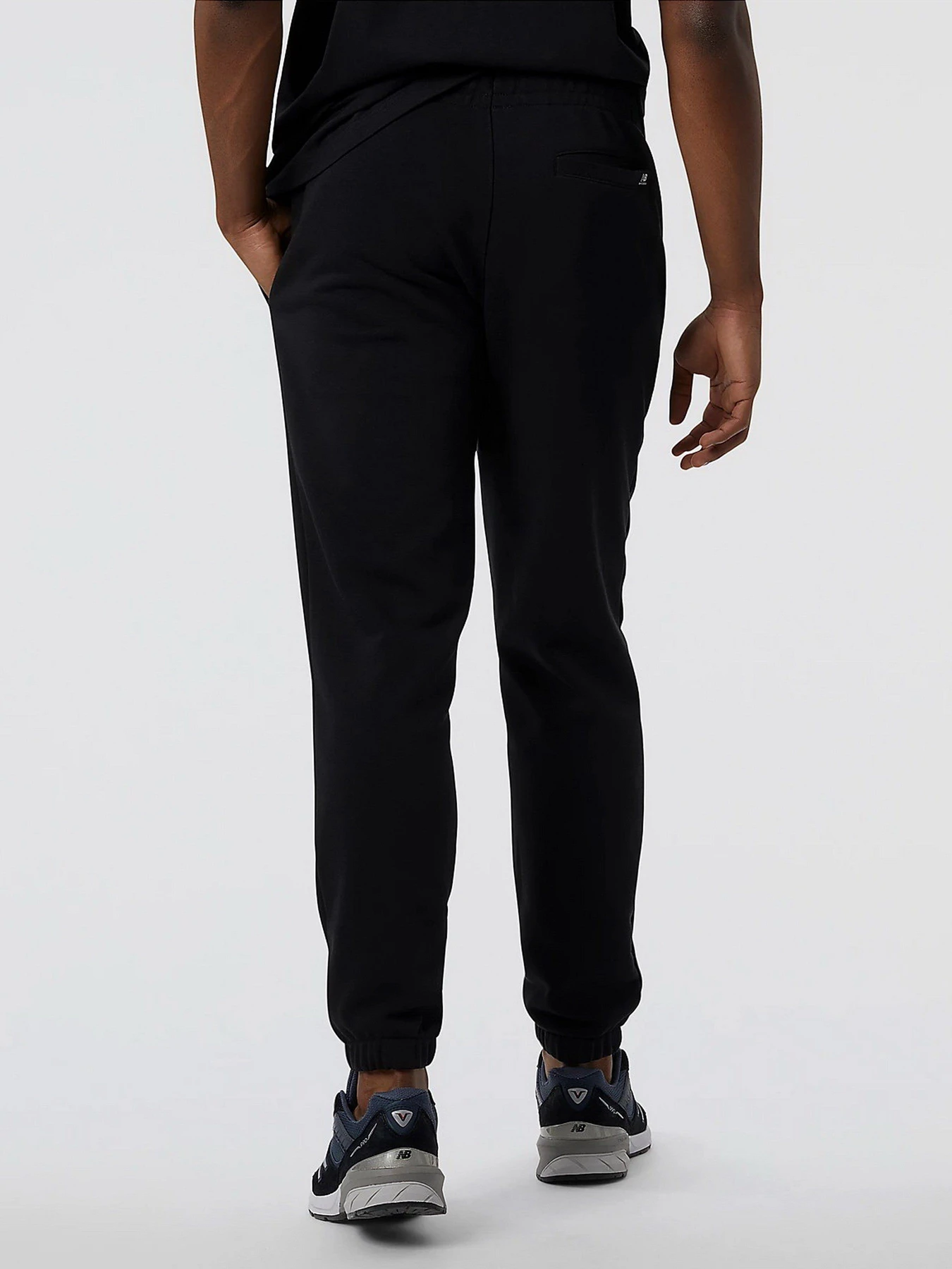 Штани New Balance Essentials Fleece модель MP23504BK Штани New Balance Essentials Fleece модель MP23504BK Фото