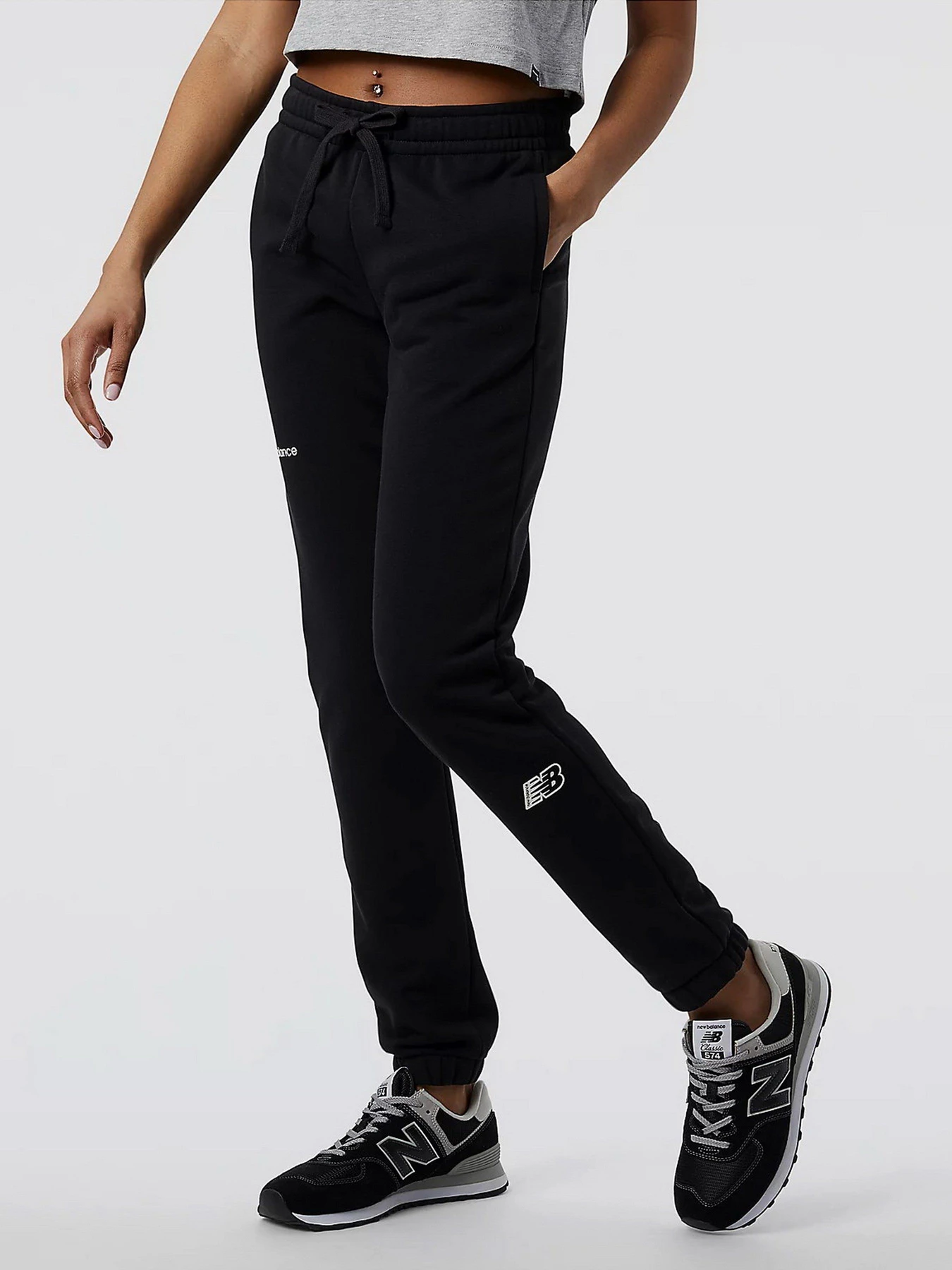 Брюки New Balance Essentials модель WP23508BK Брюки New Balance Essentials модель WP23508BK Фото